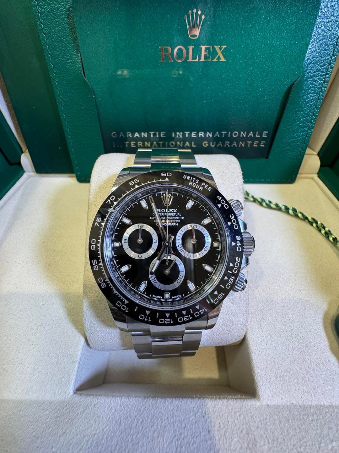May be an image of wrist watch and text
