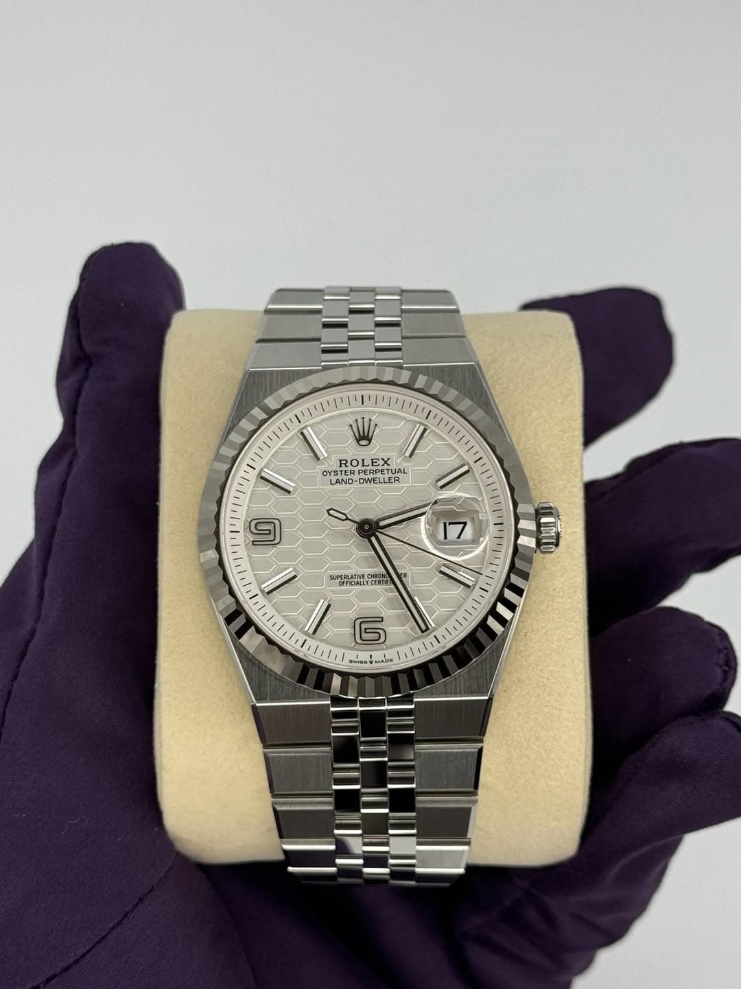 May be an image of wrist watch and text that says 'W ROL LEX EX ROLE YSTER STERPE ERPETUAL RPETUAL X AL LAND- LAND-DWELLER OWELLER DWELLER O এ 17 UOTTO OC OPFKINL I மര SADA'