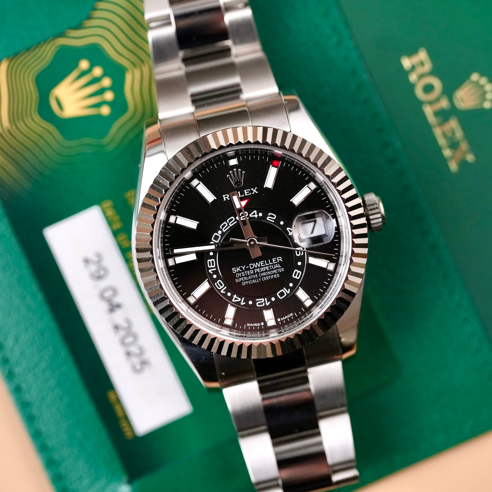 May be an image of wrist watch and text