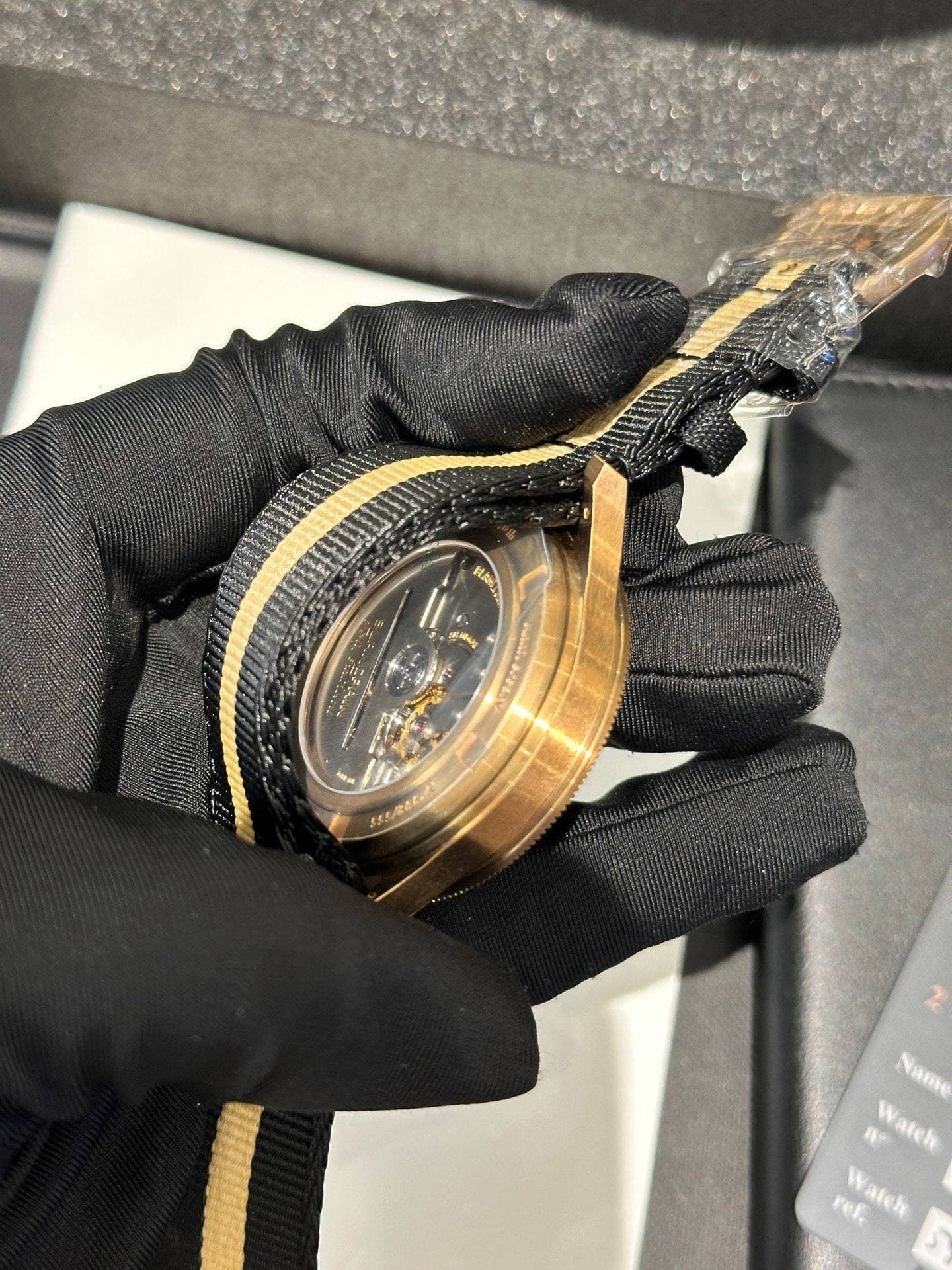 May be an image of wrist watch and text