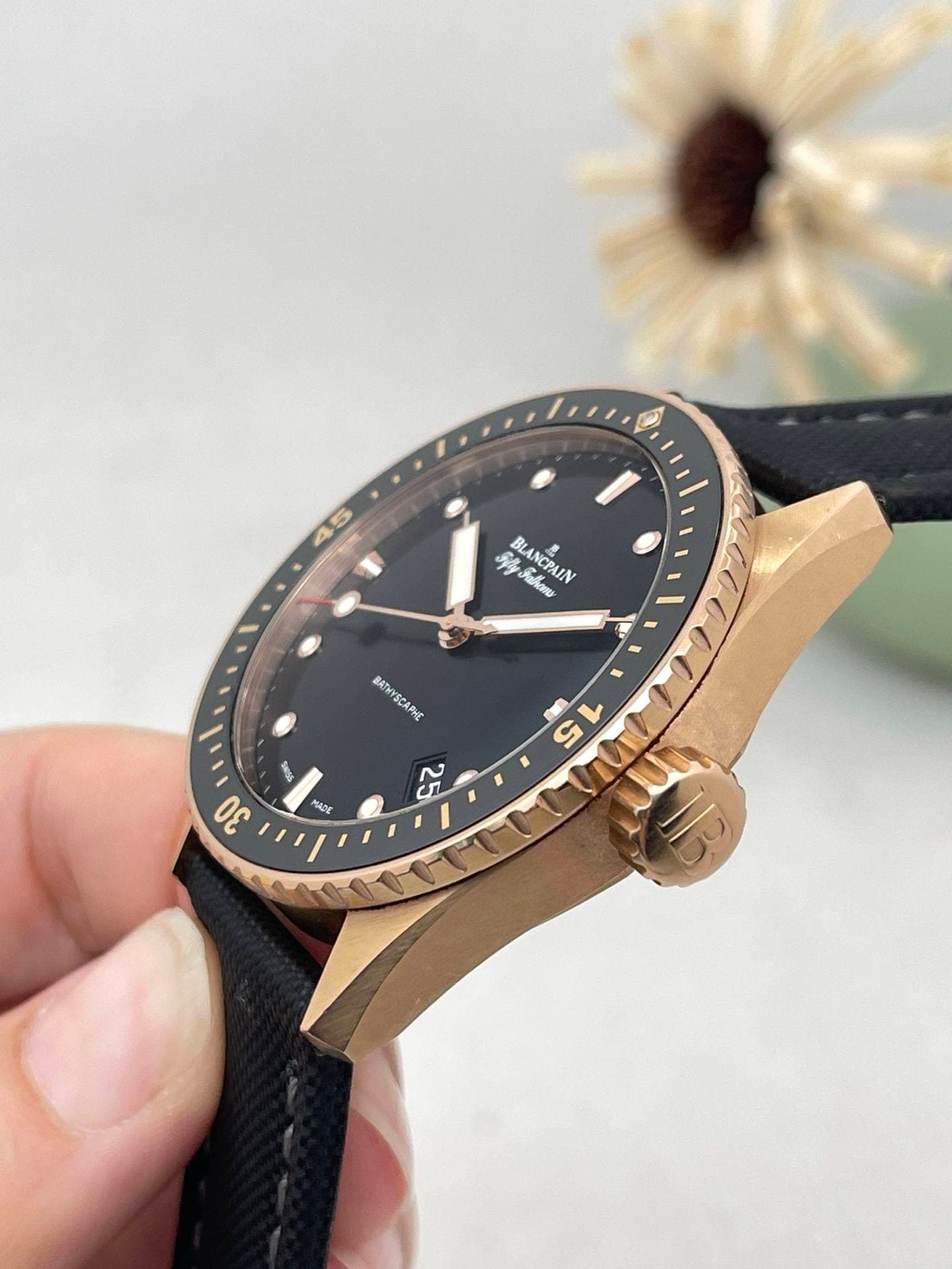 May be an image of wrist watch and text