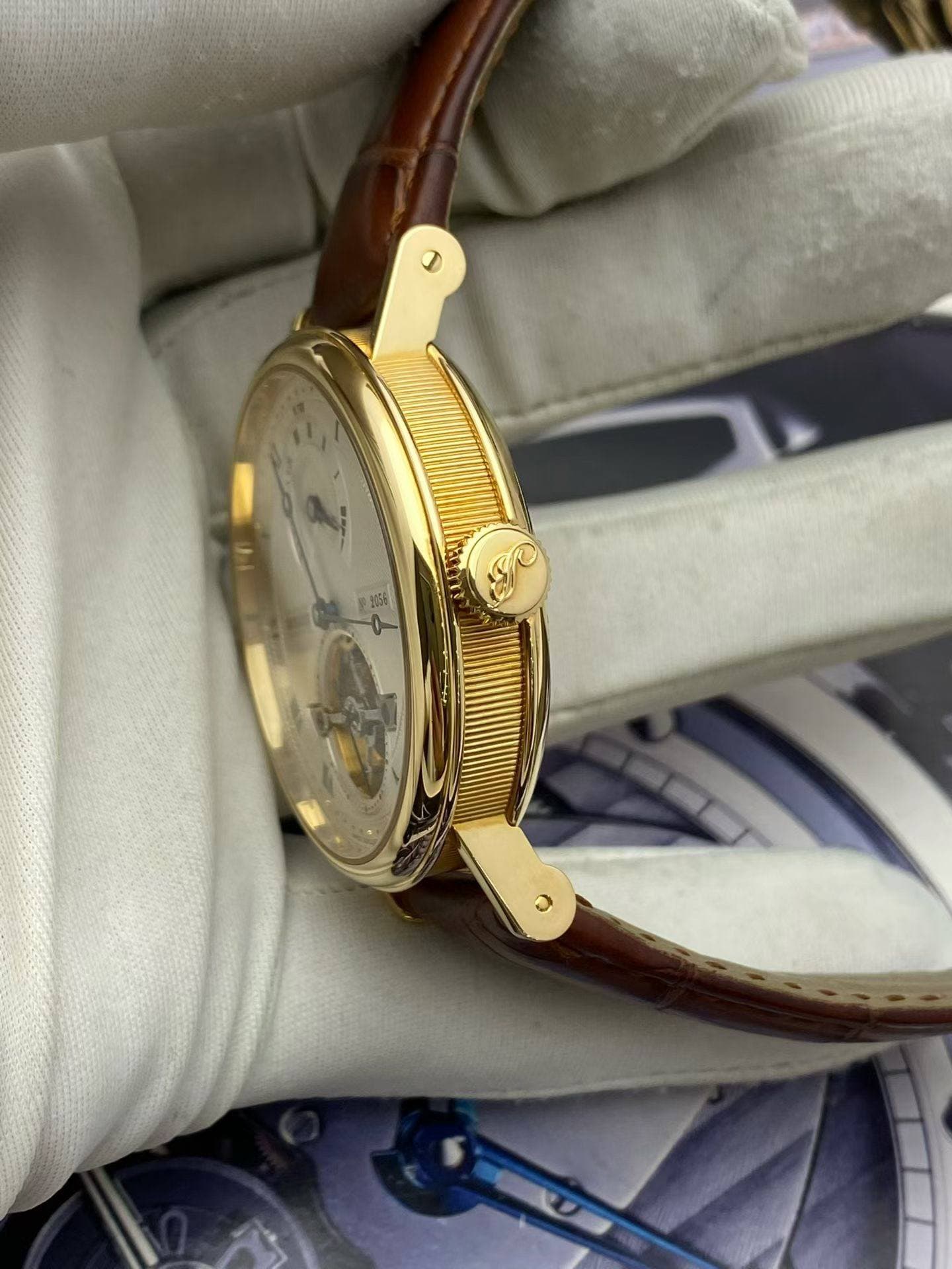 May be an image of wrist watch and text