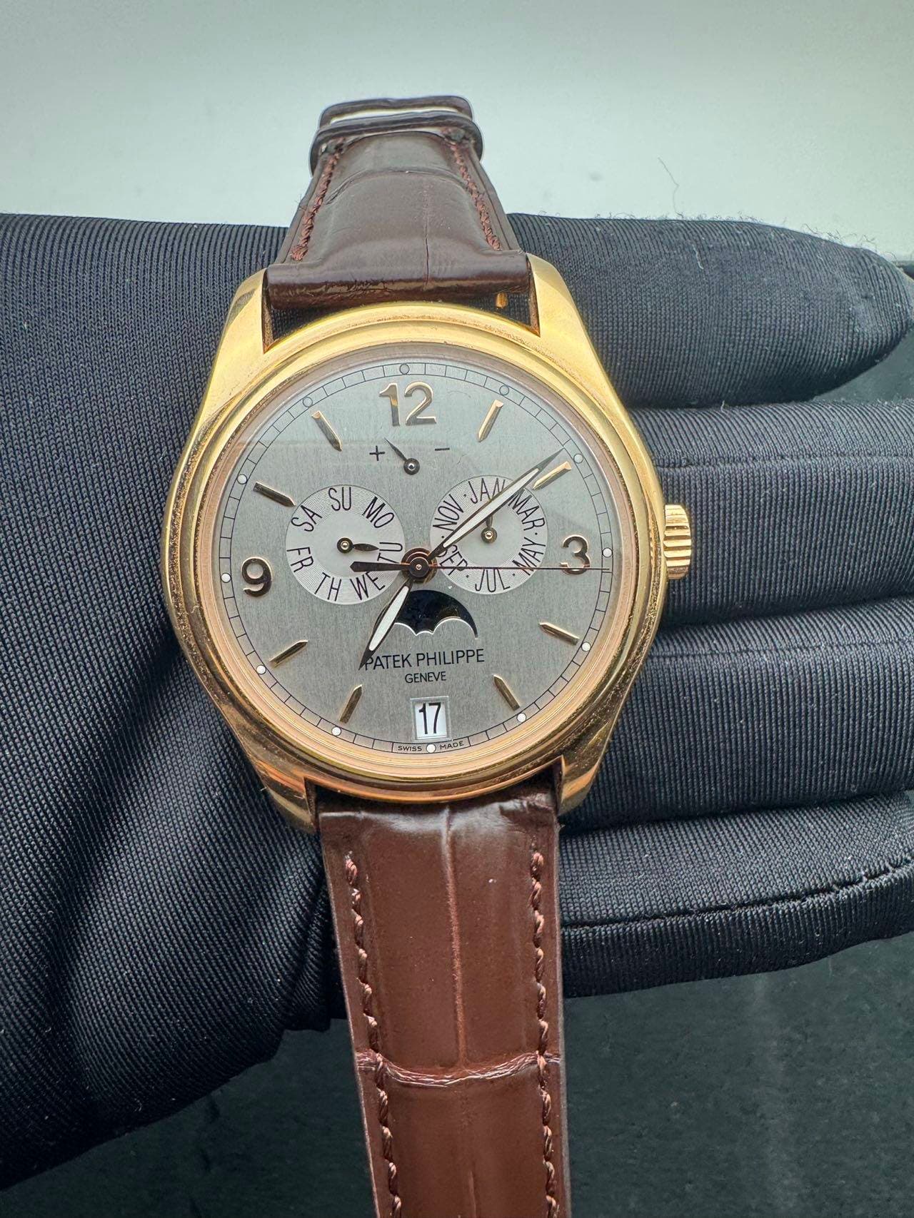 May be an image of wrist watch and text