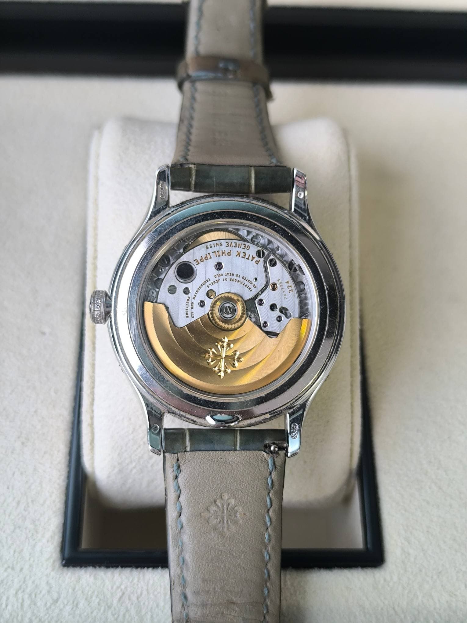 May be an image of wrist watch and text