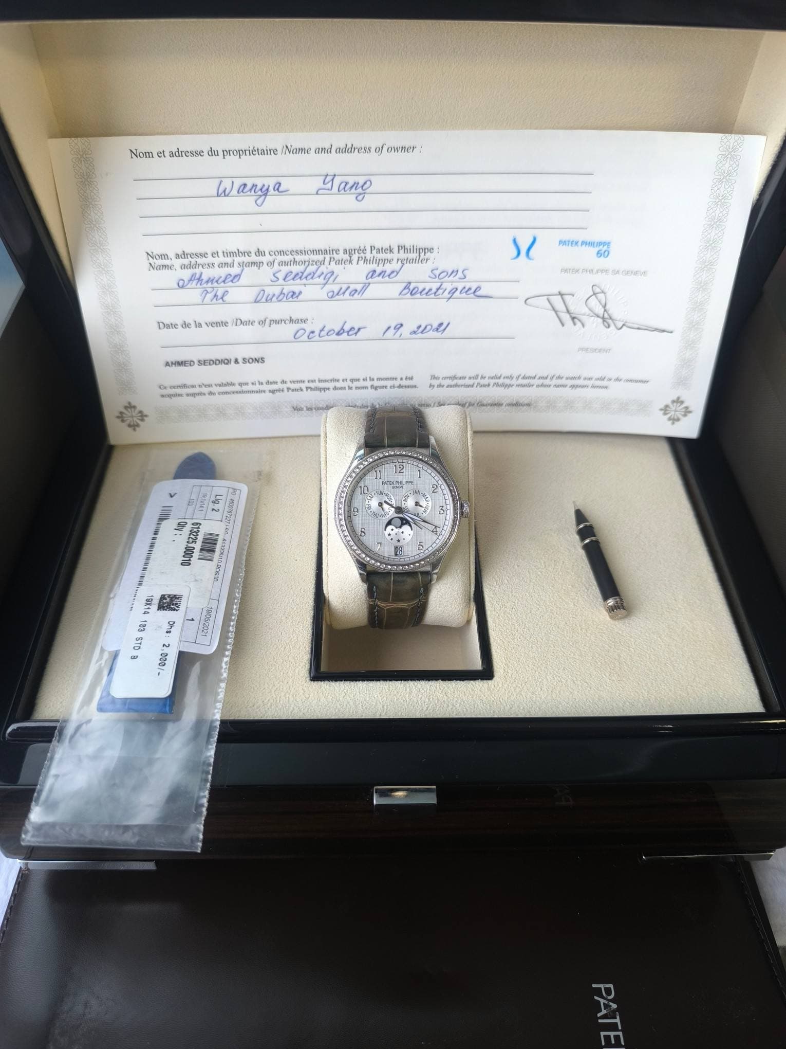 May be an image of wrist watch and text