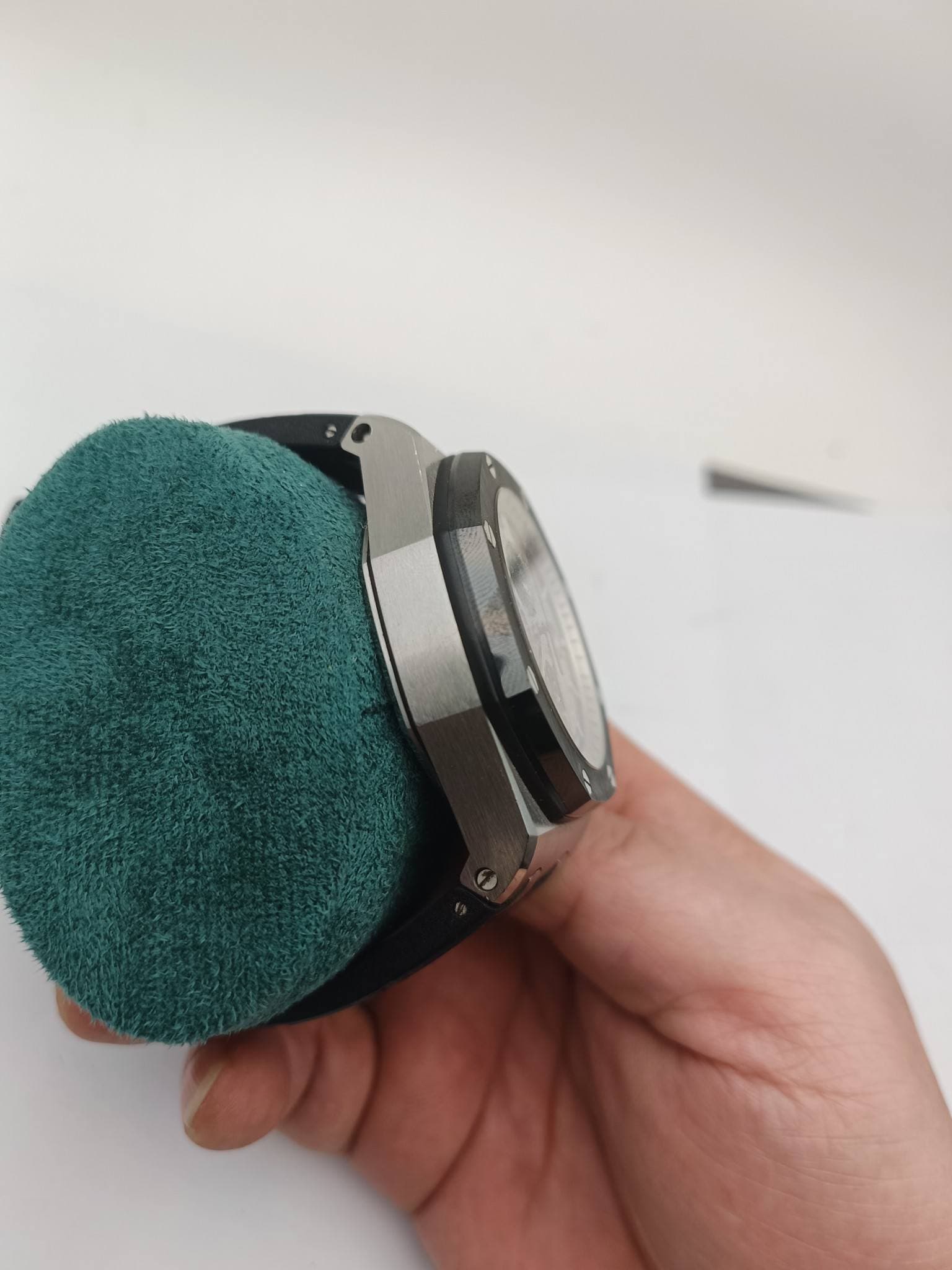 May be an image of saddle-stitched leather and wrist watch