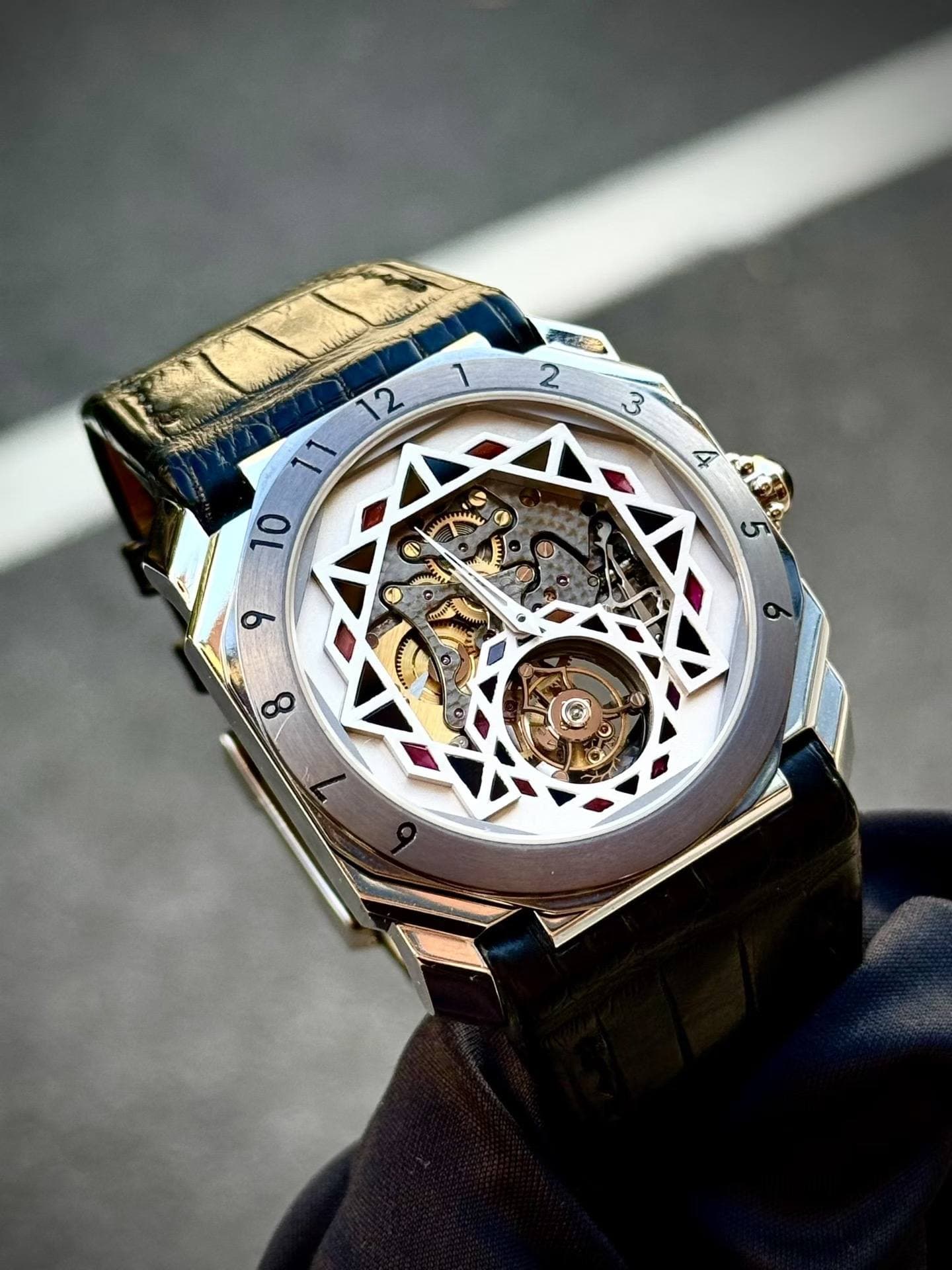 May be an image of wrist watch and text