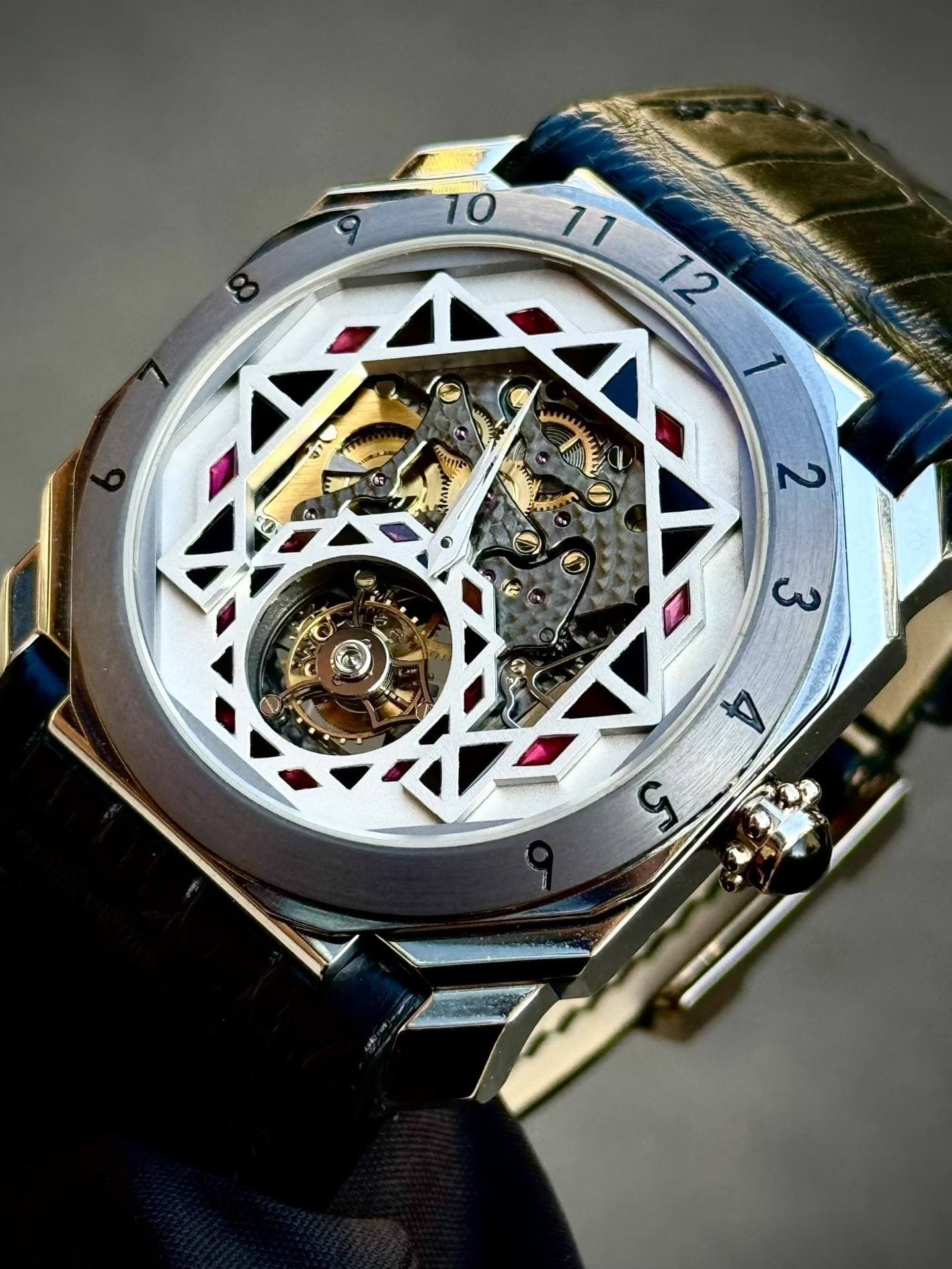 May be an image of wrist watch and text