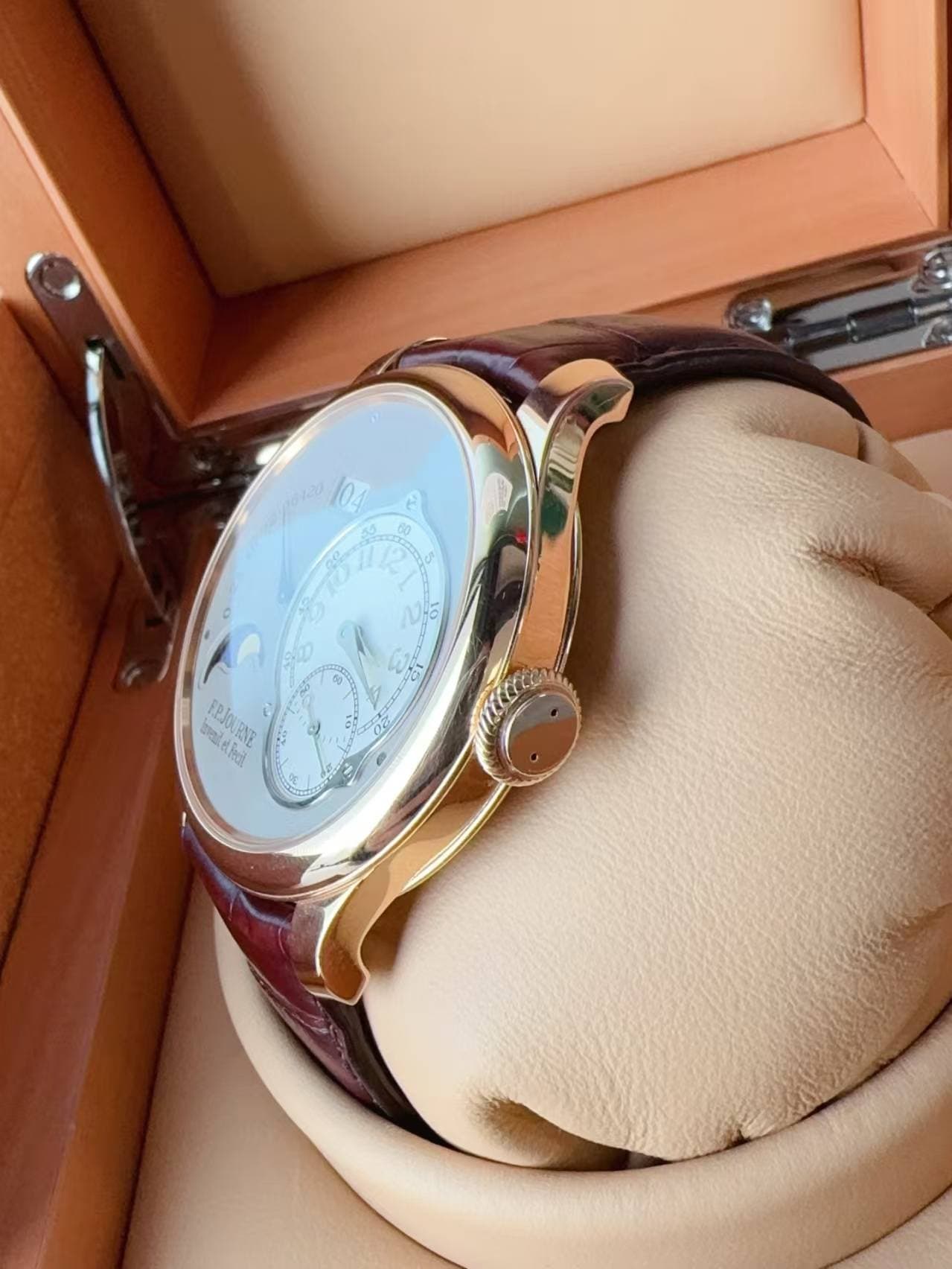 May be an image of wrist watch and text