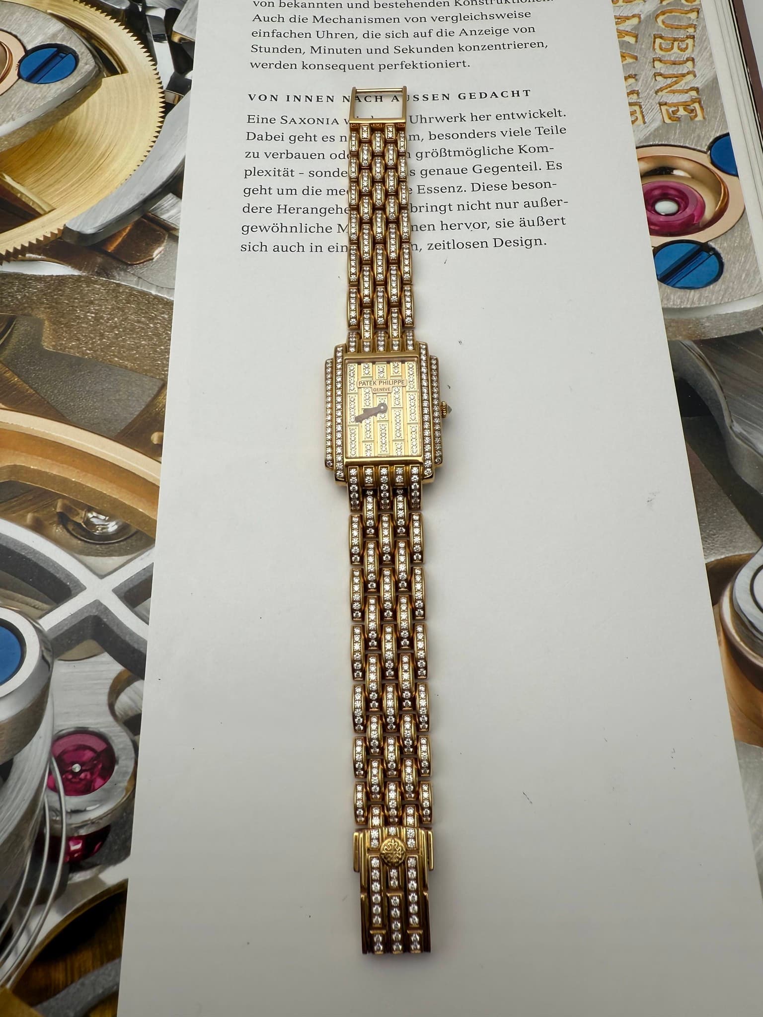 May be an image of wrist watch, jewelry and text