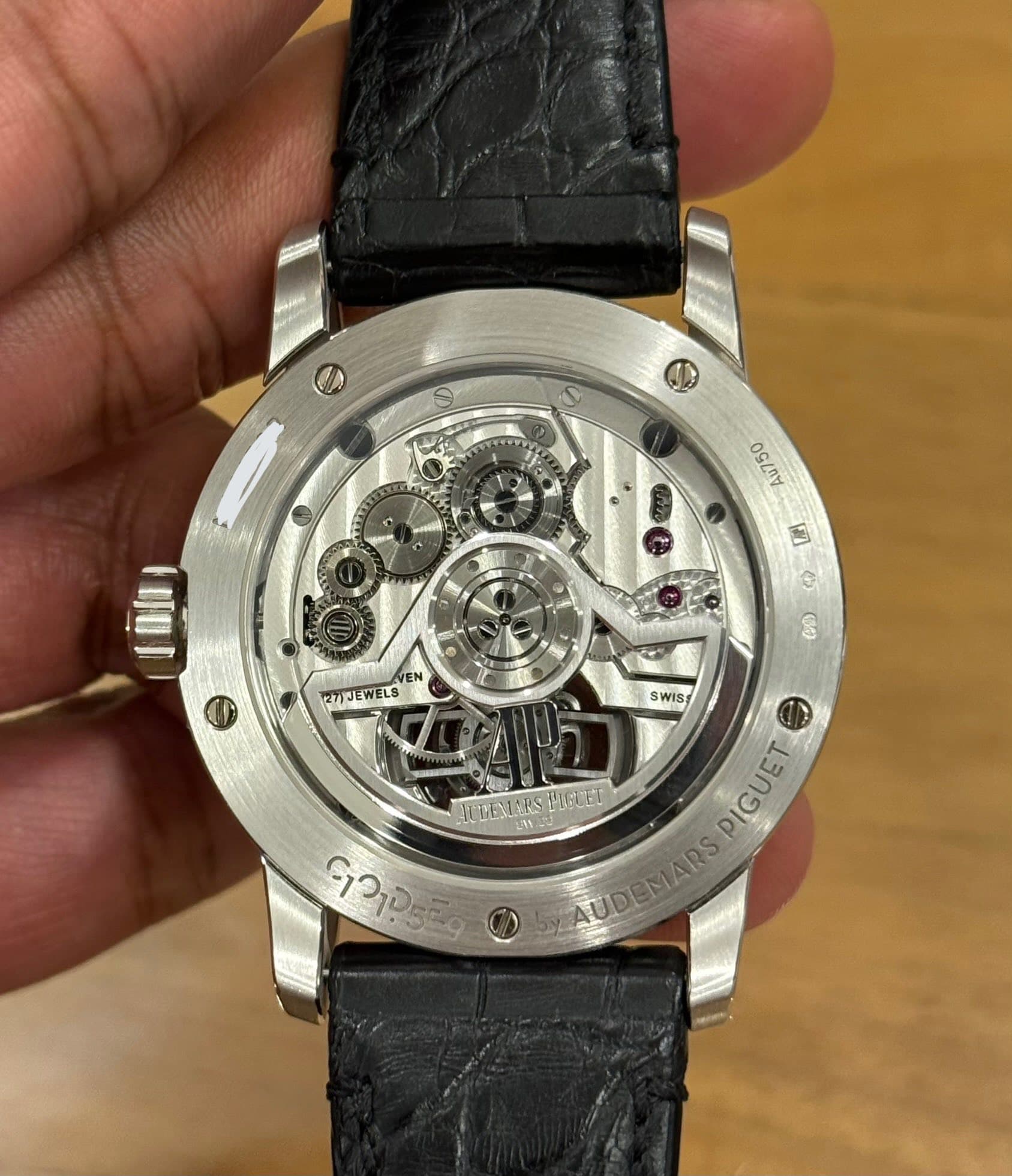 May be an image of wrist watch and text