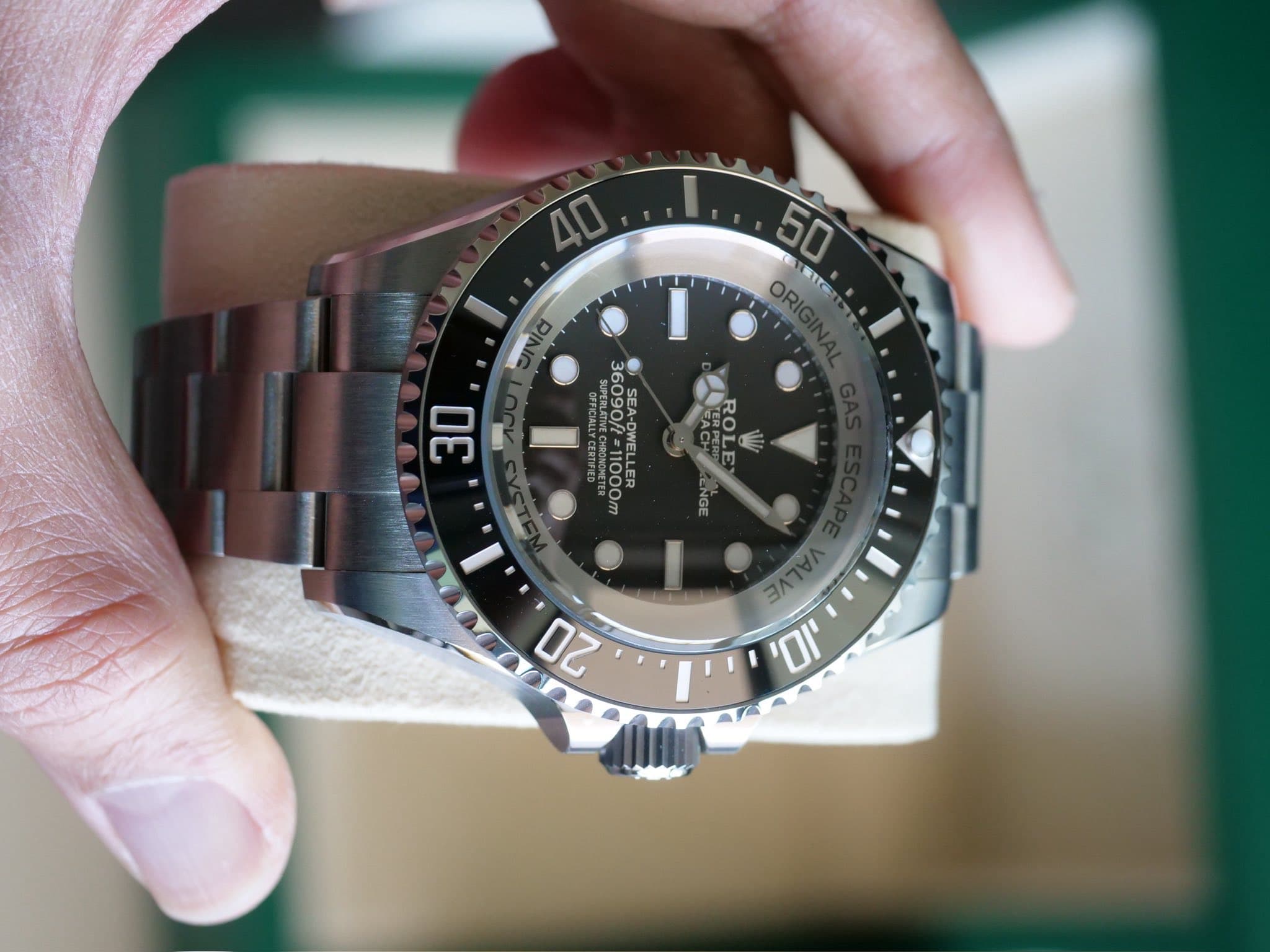May be an image of wrist watch and text