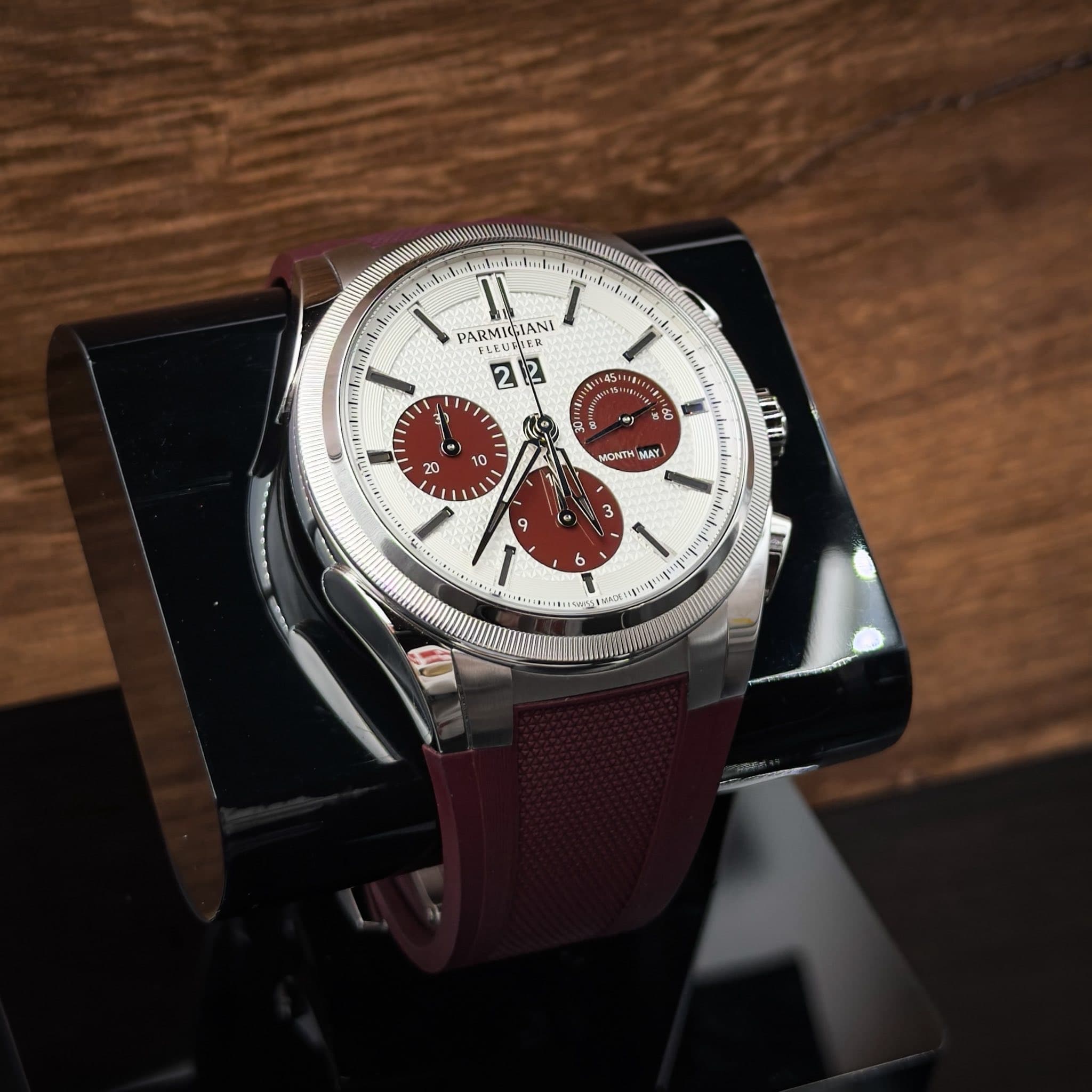 May be an image of wrist watch and text