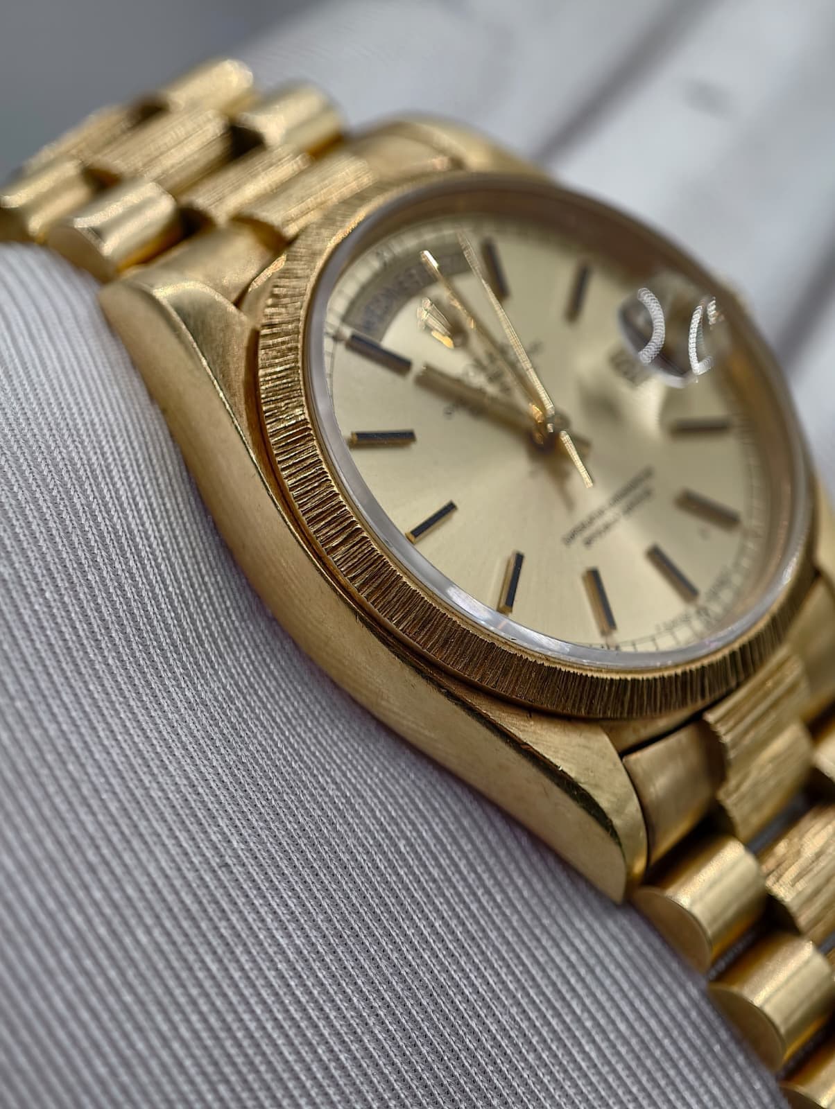 May be an image of wrist watch and text