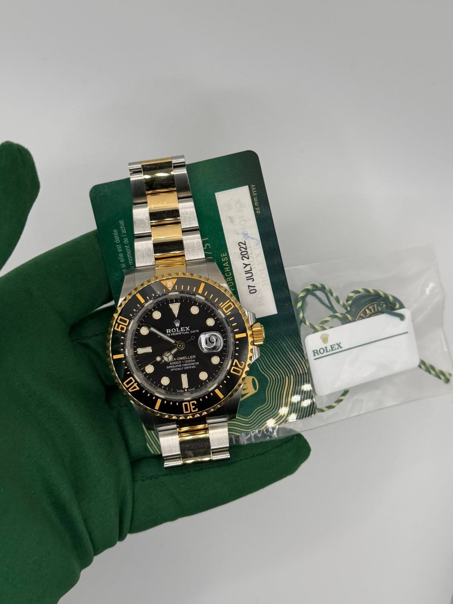 May be an image of wrist watch and text that says '3 2022 מעוך לחרג LO 50 ROLEX EX ROL 1. 10 20 WAn 000 - ROL ROLEX EX 40 σE አሰስ'