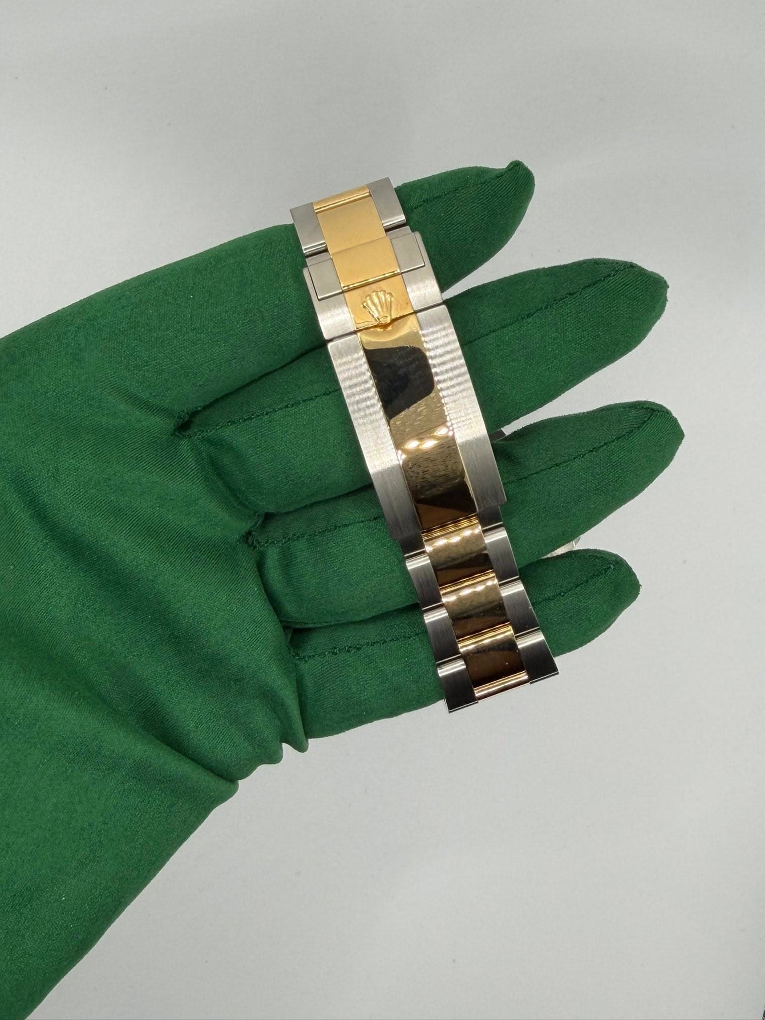 May be an image of jewelry and wrist watch