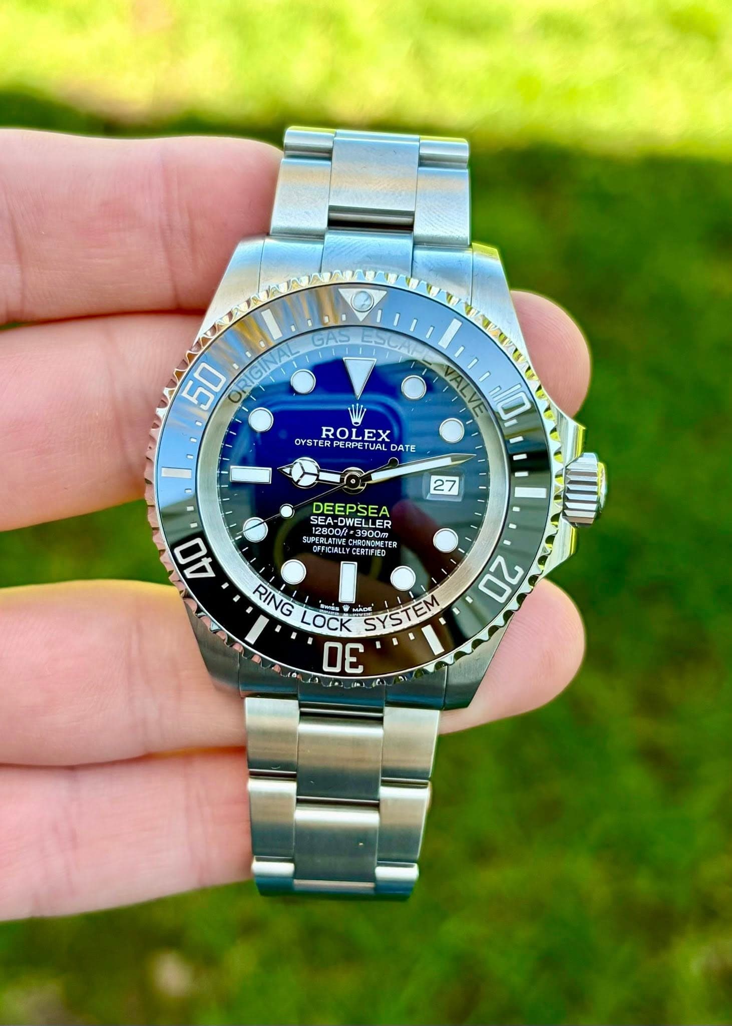 May be an image of wrist watch and text that says 'GAS ကြမေ 50 OF SIN ROLEX LEX OYSTER PERPETI PERPETU DATE 10 27 40 DEEPSEA SEA- SEA DWELLER SLPERLATINE LPERLATIVE AOuESE ELAT…