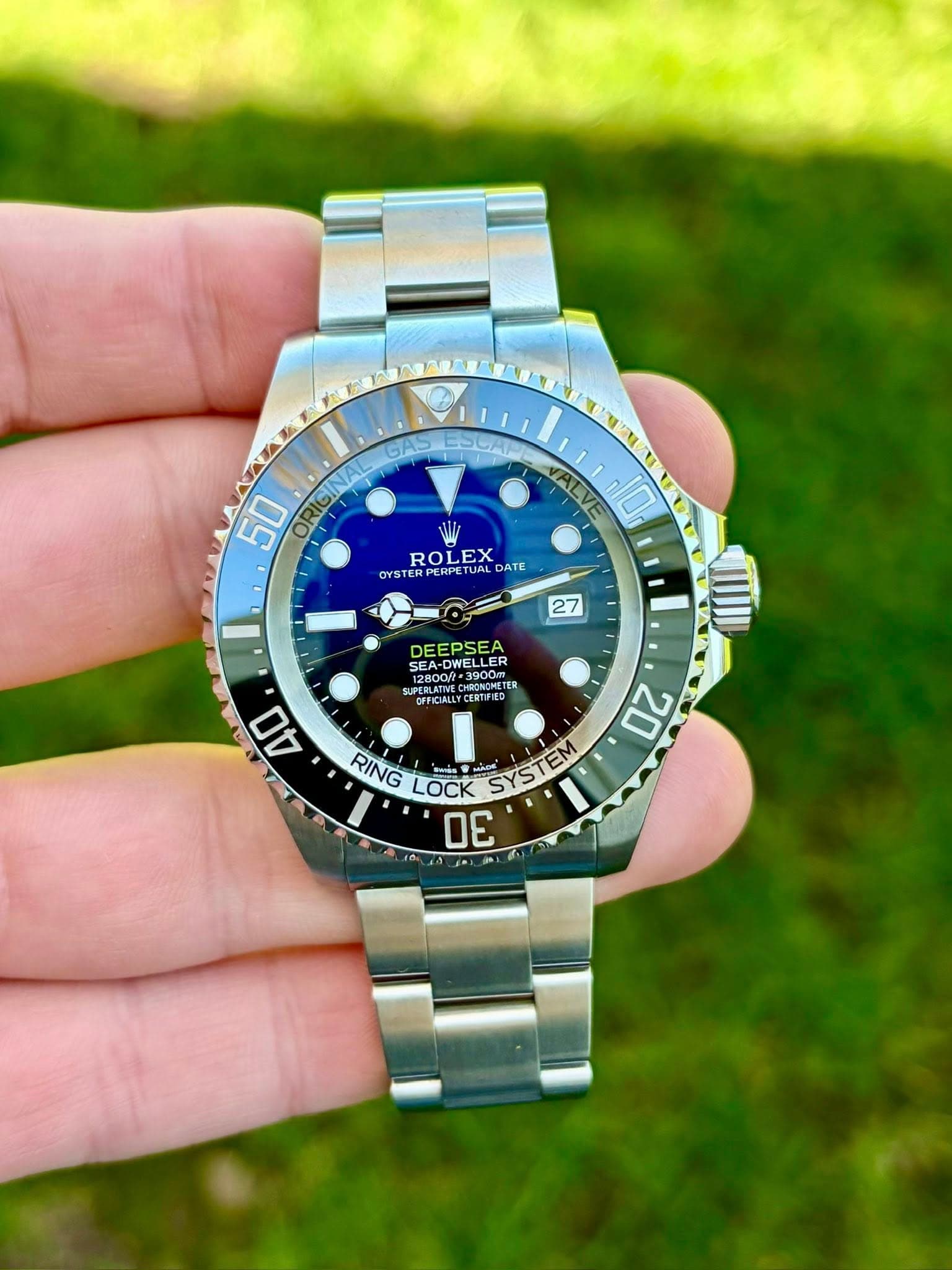 May be an image of wrist watch and text