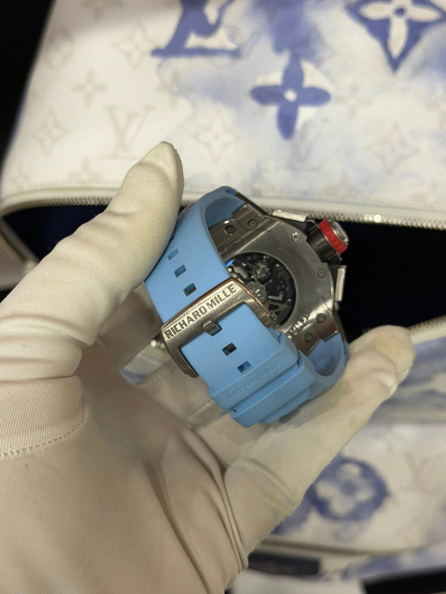 May be an image of wrist watch and text