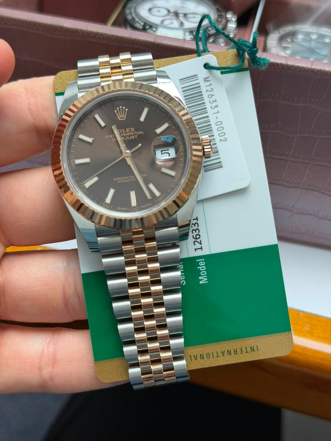 May be an image of wrist watch and text
