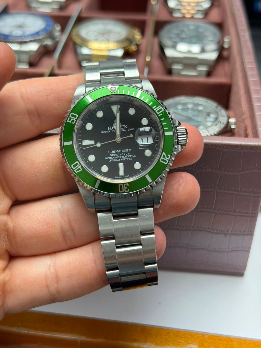 May be an image of wrist watch and text
