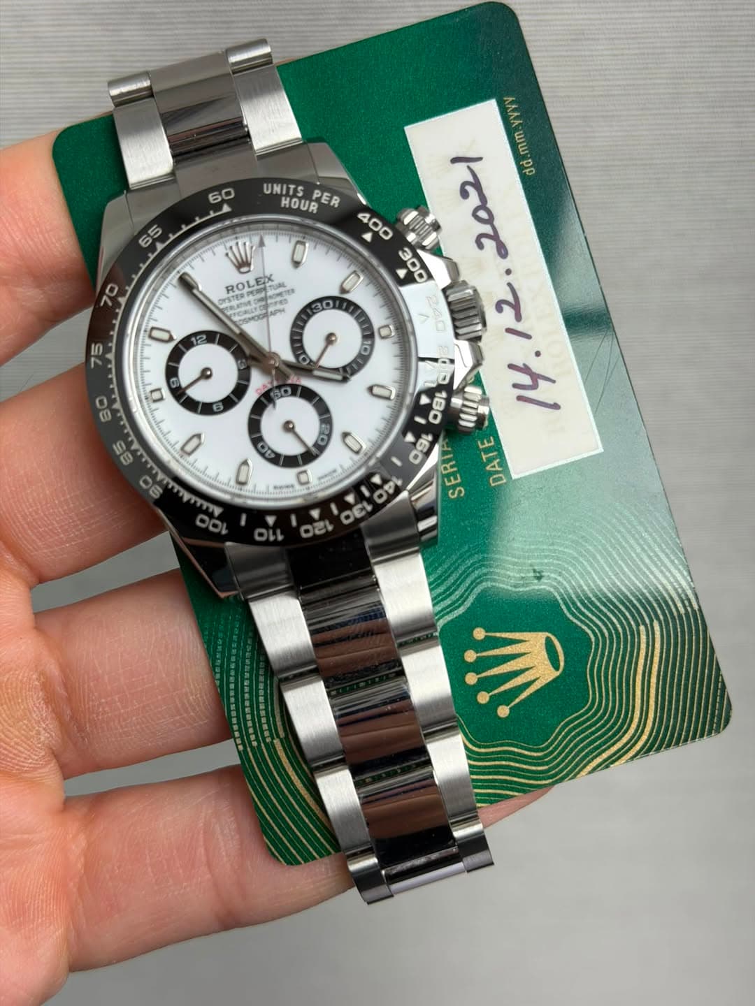 May be an image of wrist watch and text