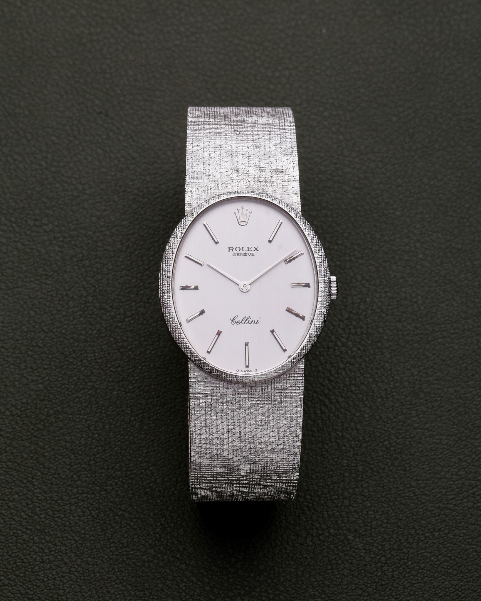 May be an image of wrist watch and text that says 'I ROLEX GENEVE 一 M 如事 bellini バ'