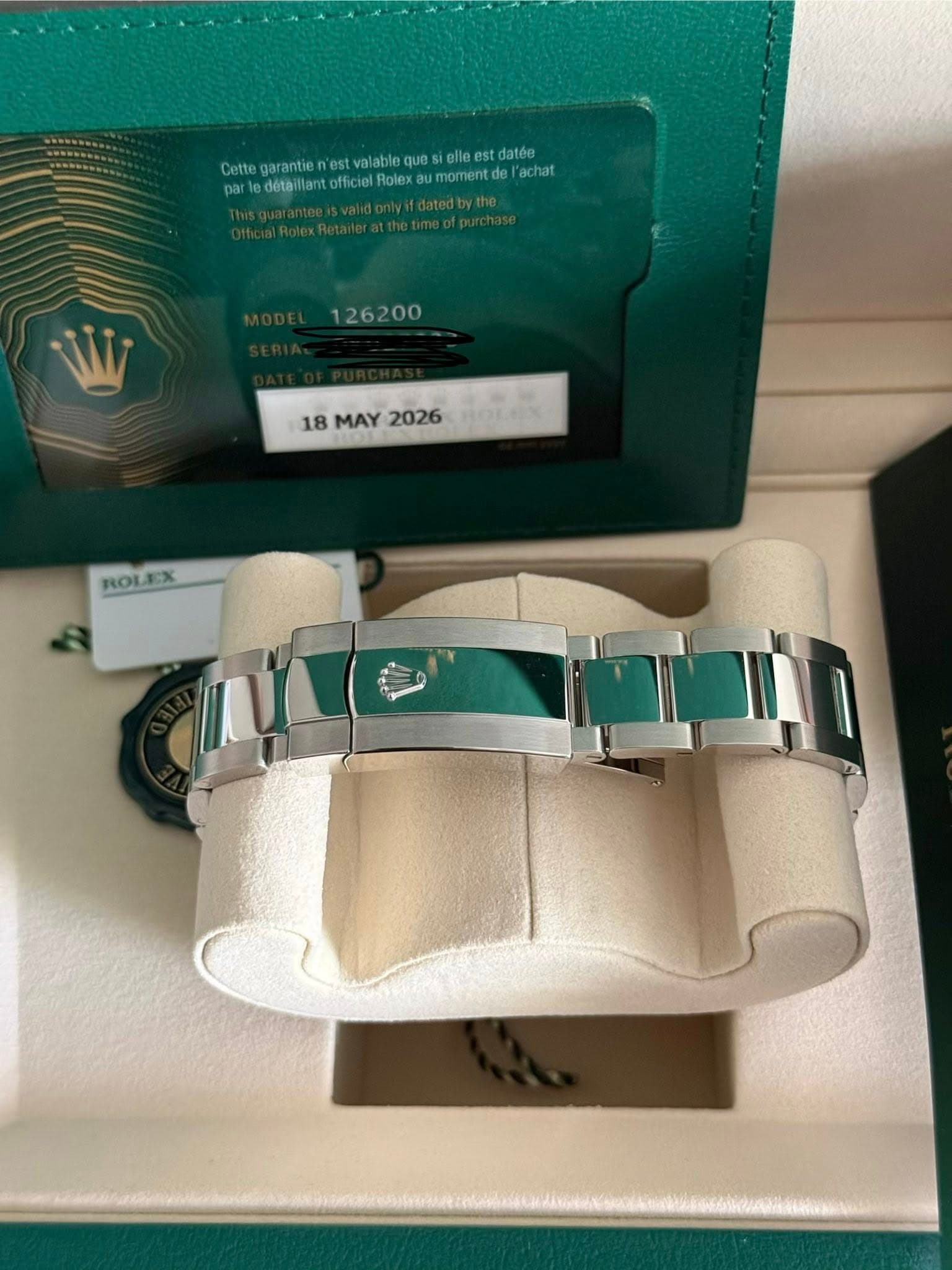 May be an image of wrist watch and text