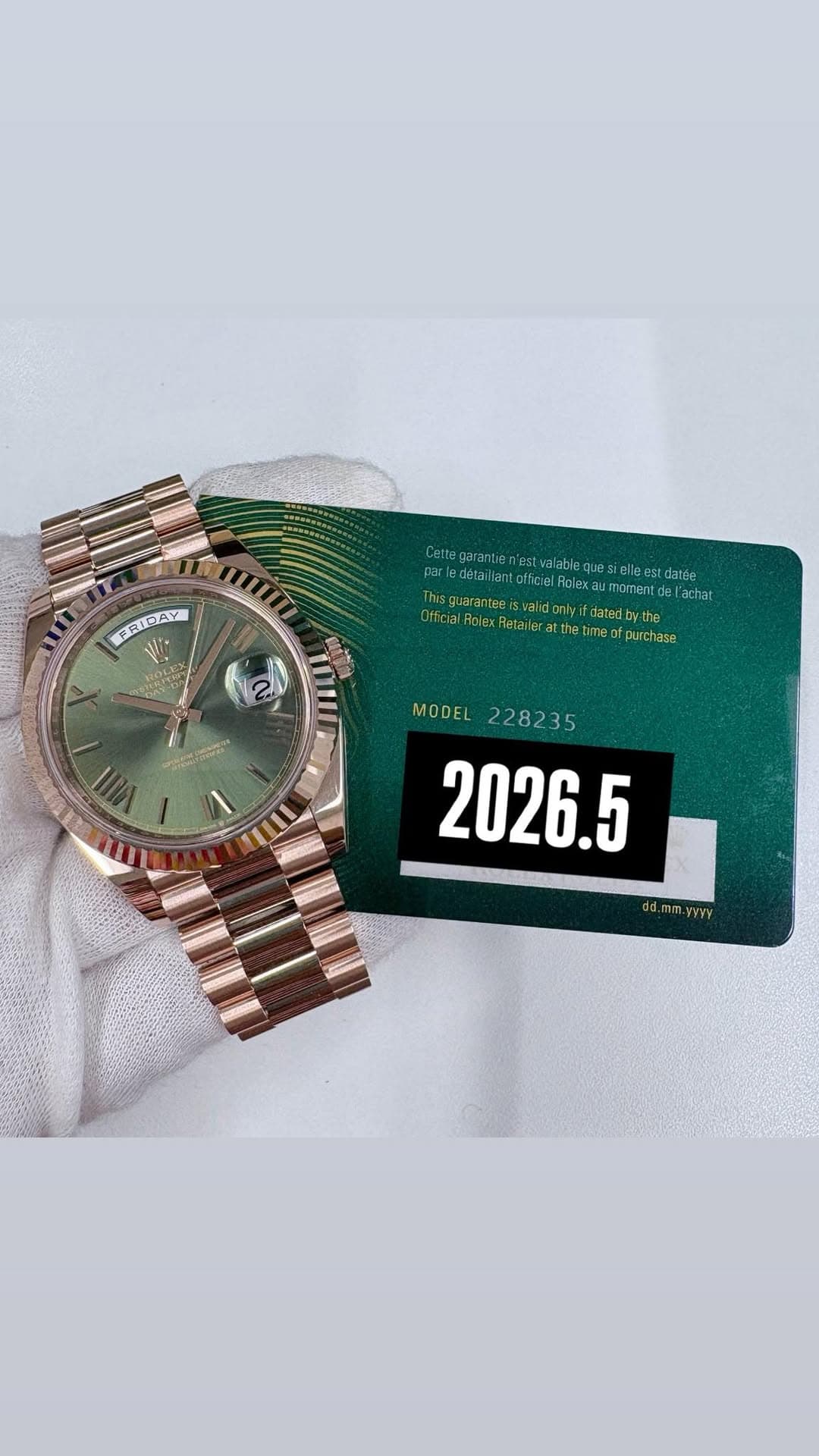 May be an image of money, digital watch and text
