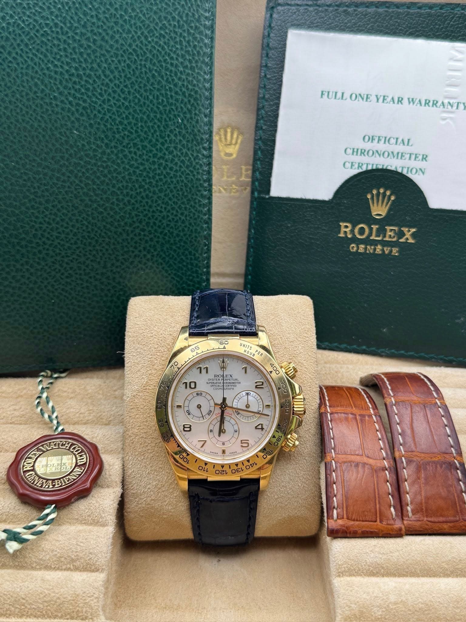 May be an image of wrist watch and text