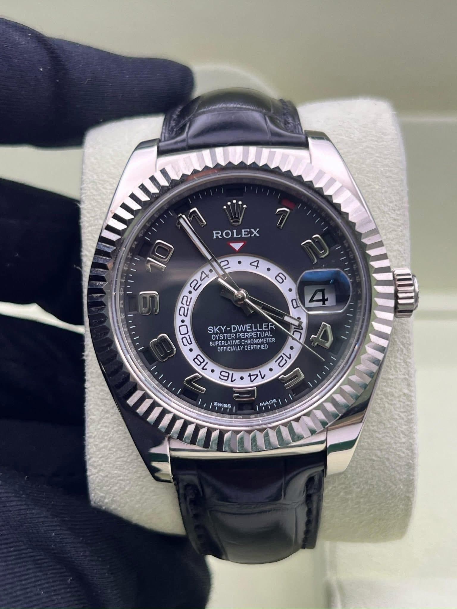 May be an image of wrist watch and text that says 'ROLEX I -DWEL ER OYSTER SKY-DWELLER OYSTER RPERPETUR PETUAL DEGLATIVE PERLATVE Opooй M OFFICIALLY CERTIF TEDPERPETUAL CAANOMETER…