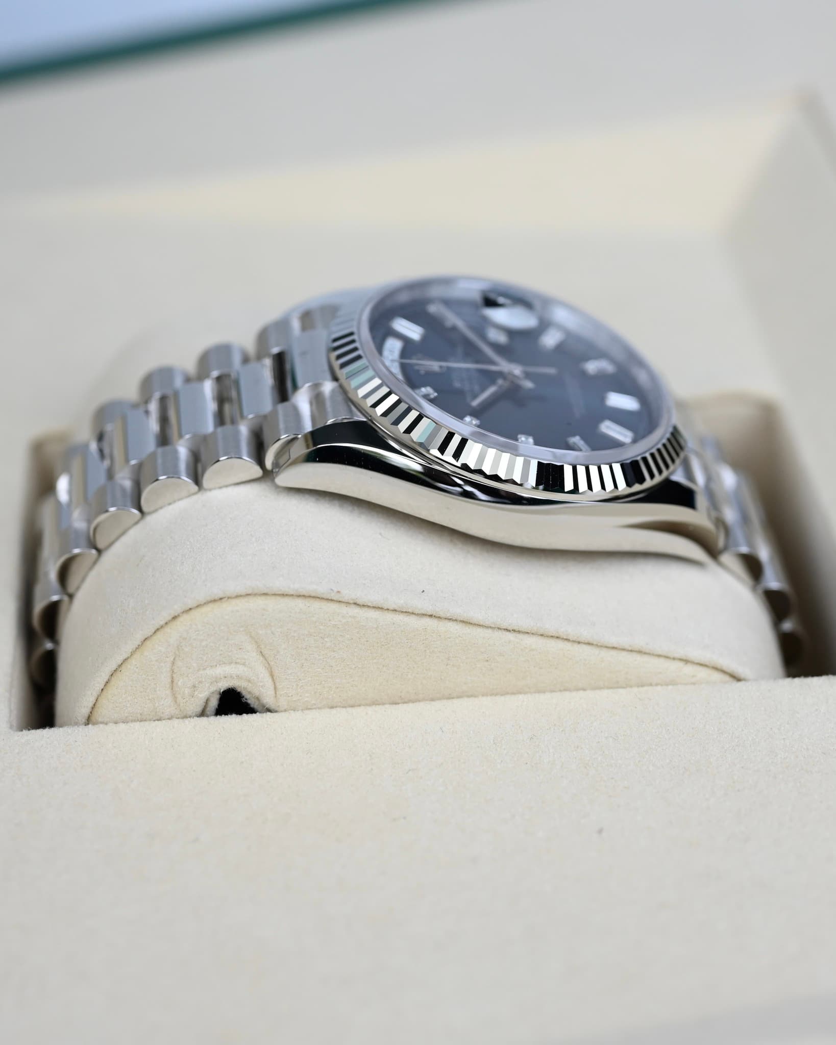 May be an image of wrist watch and text