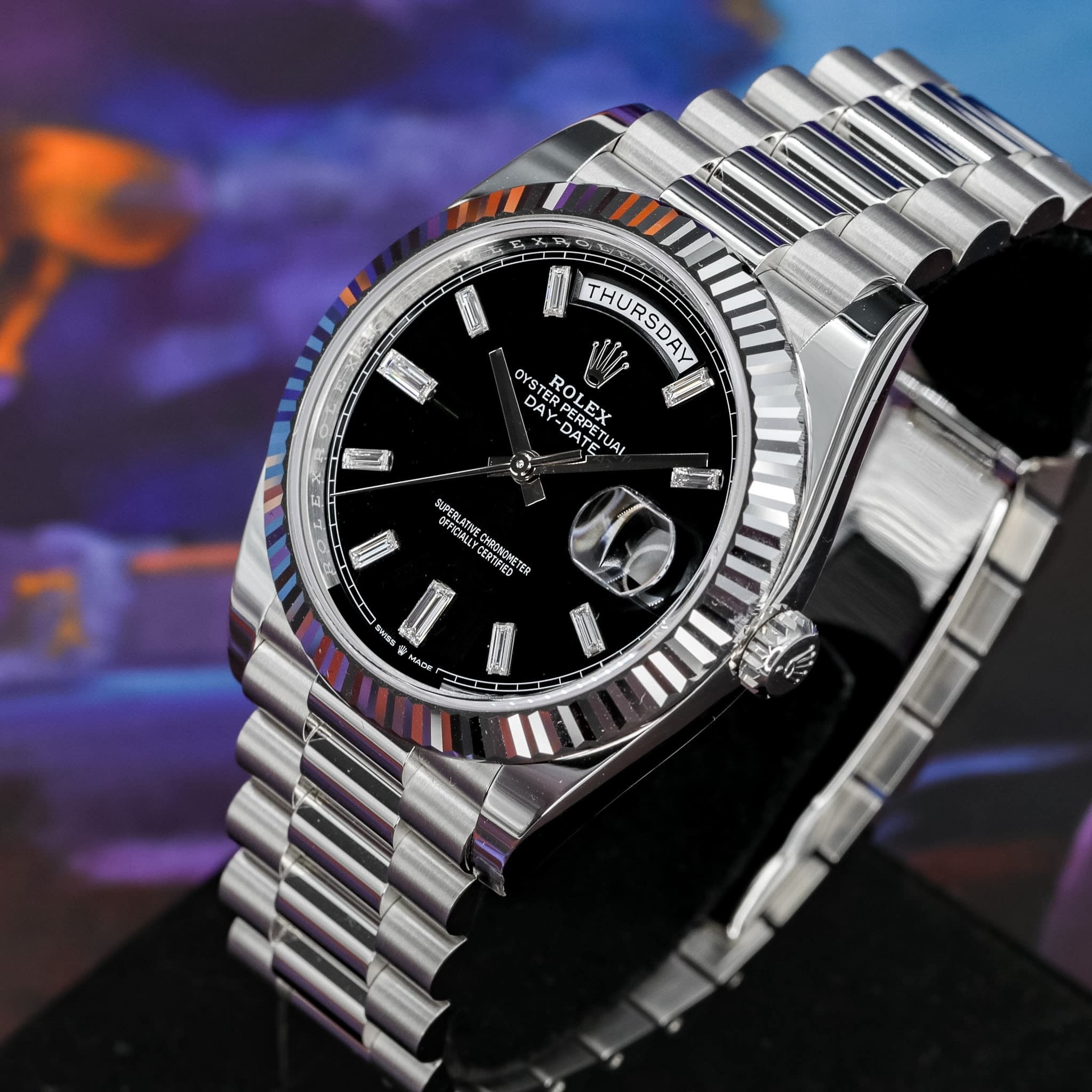 May be an image of wrist watch and text