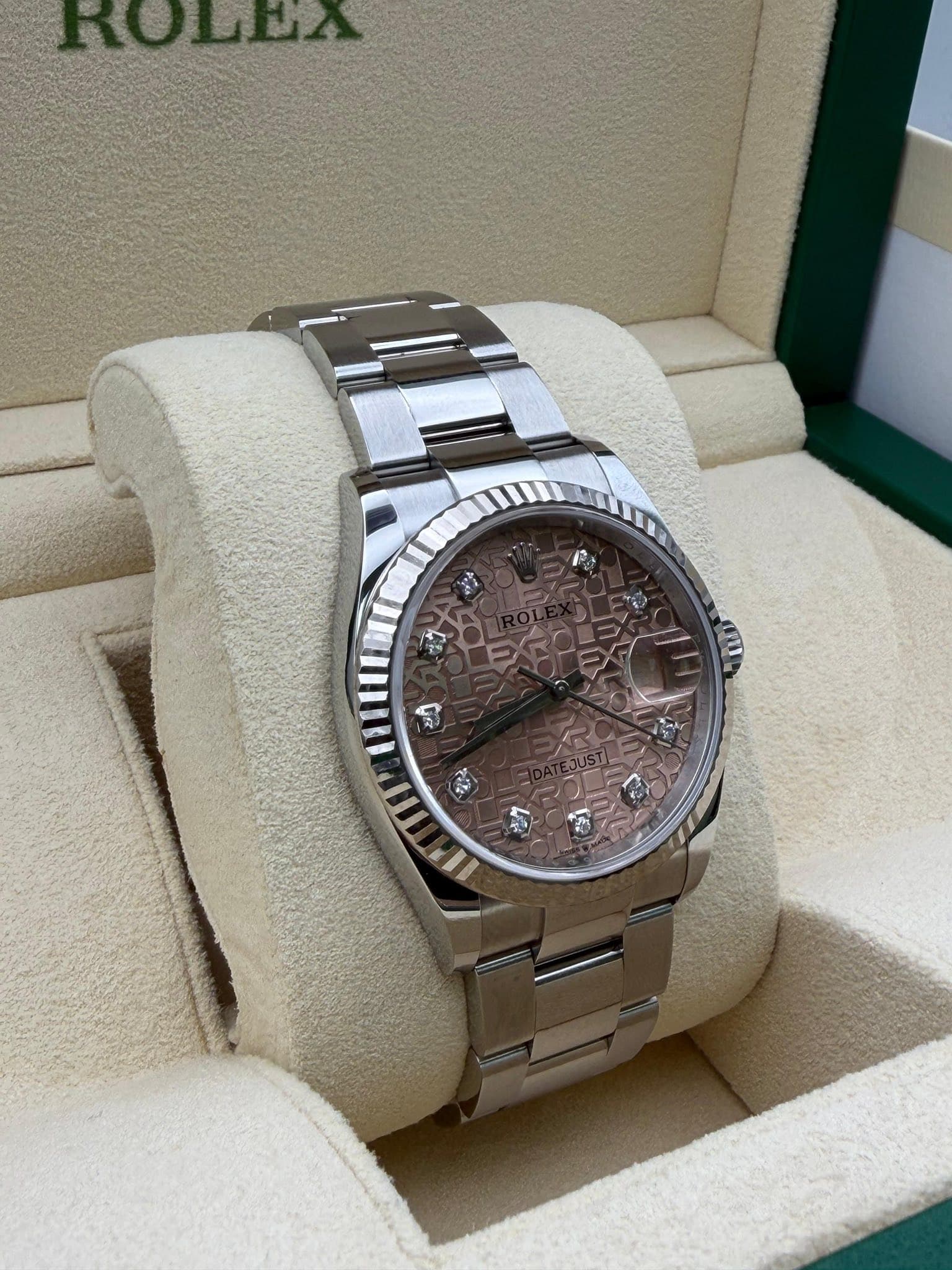 May be an image of wrist watch and text