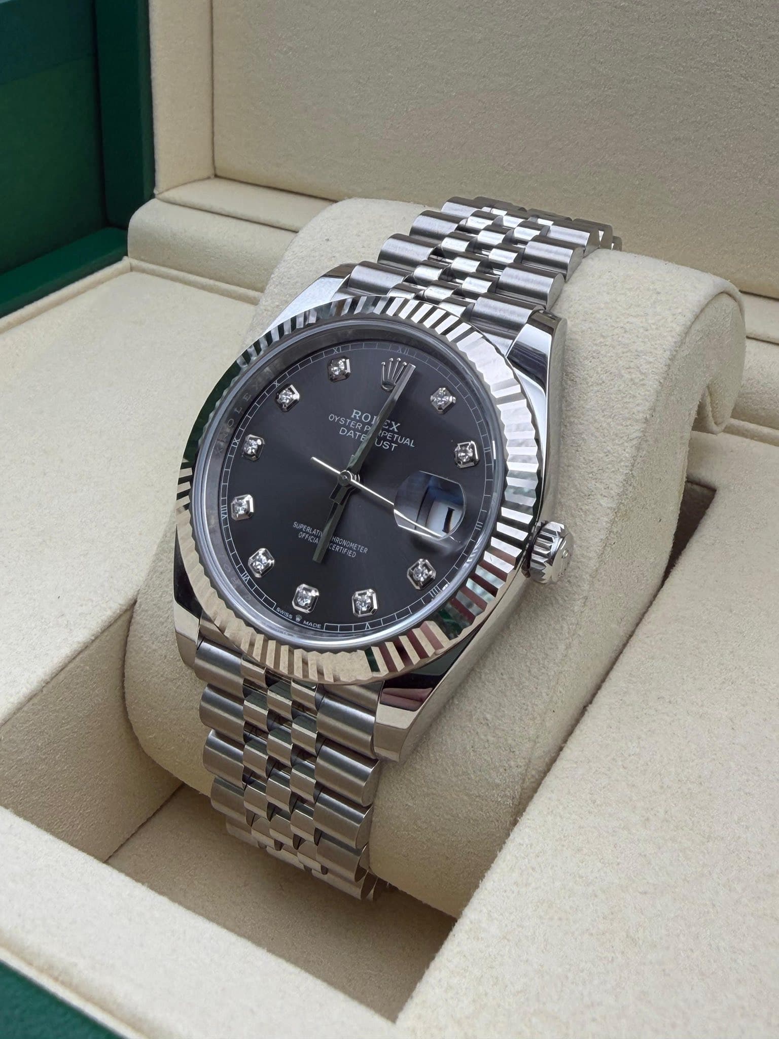 May be an image of wrist watch and text