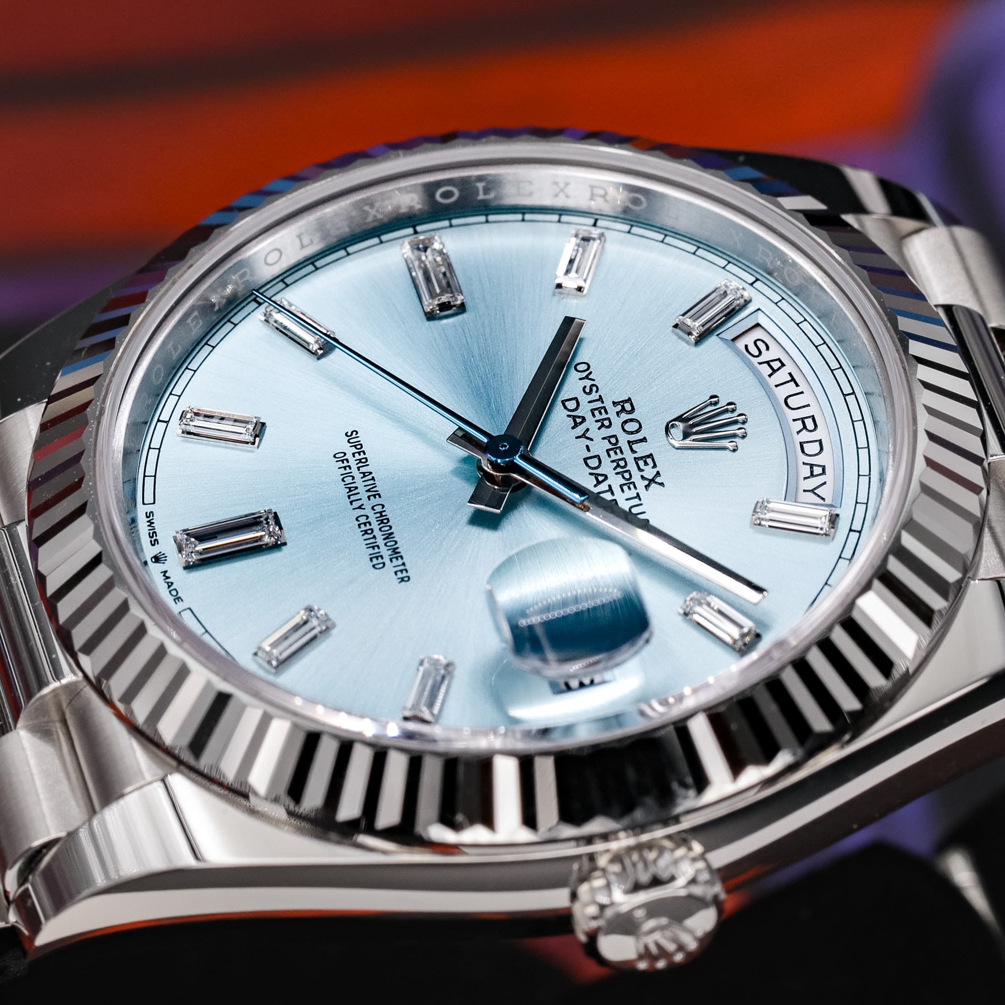May be an image of wrist watch and text that says 'XИ 凍OHEKRO O E 4 OFFICIRII OFFICIALLYC DEFICIALL AERICIALLY MIDERLATNE ATINE ATIVE SWISS ש CERTIFIED CHRONOMETE ONOMETER MADE…