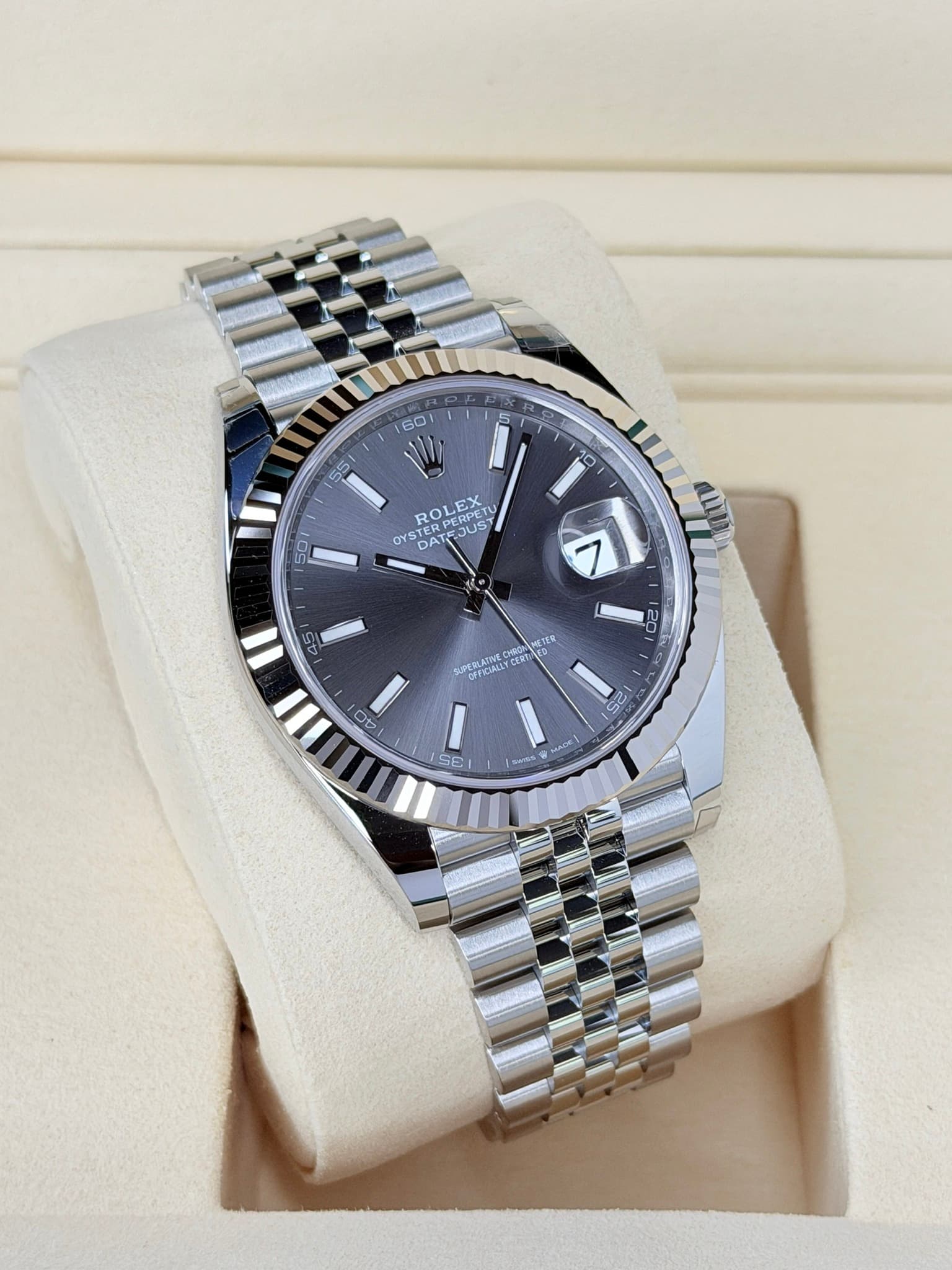 May be an image of wrist watch and text