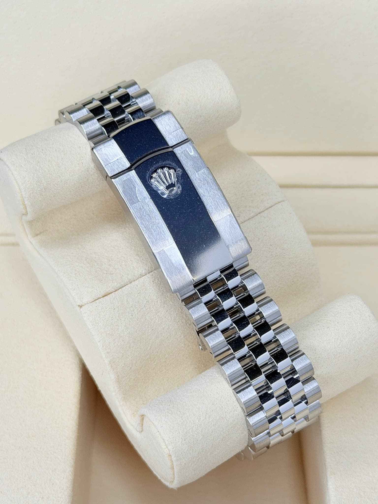 May be an image of wrist watch and jewelry