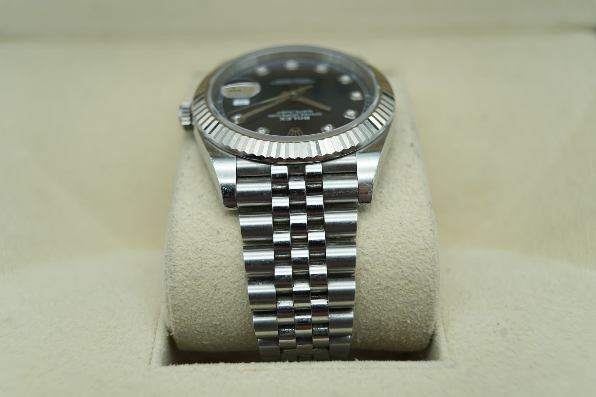 May be an image of wrist watch and text
