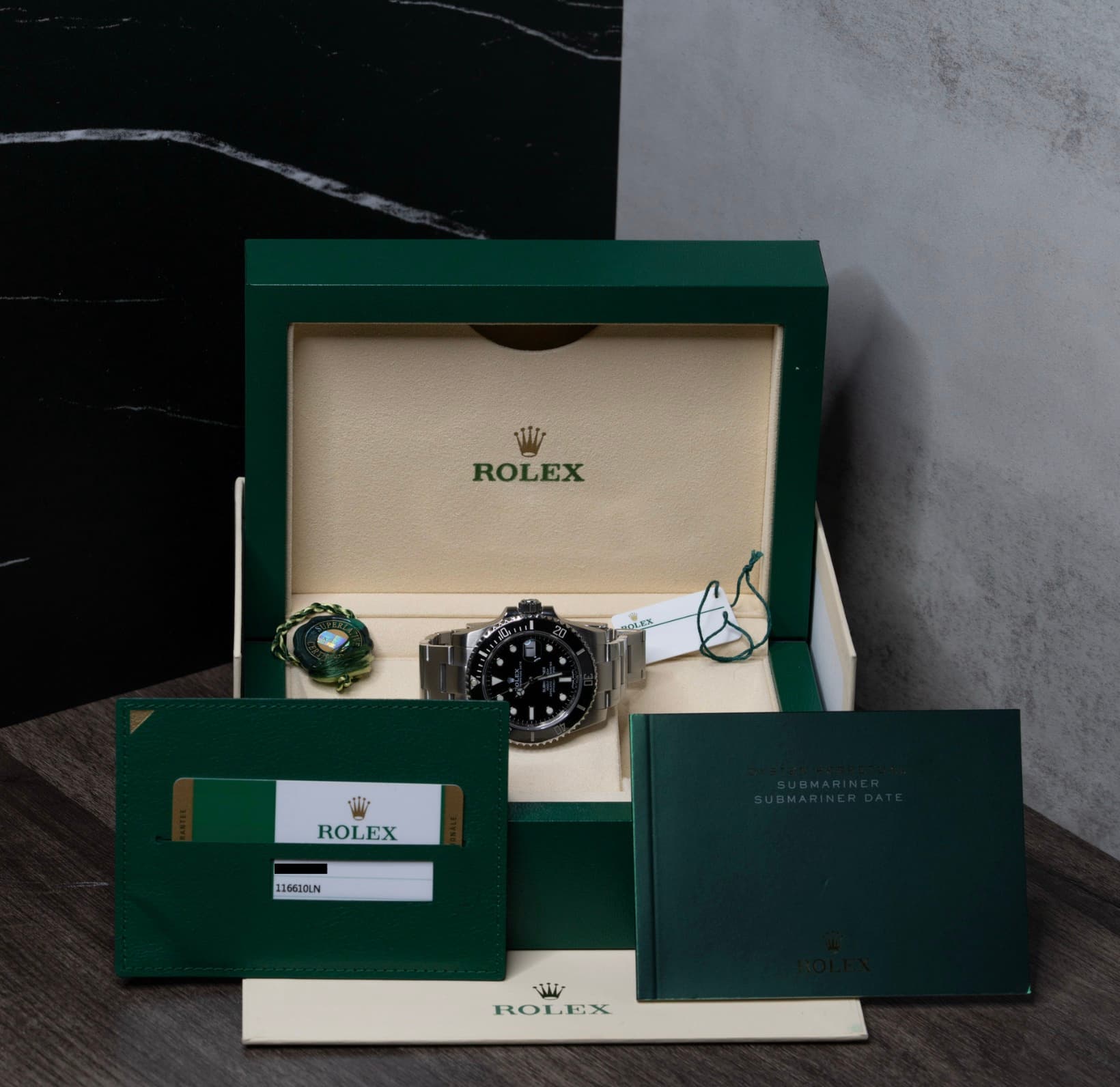May be an image of wrist watch and text that says '1T ROLEX ROLEX 1106L0LN ROLEX تقفقا ROLEX'