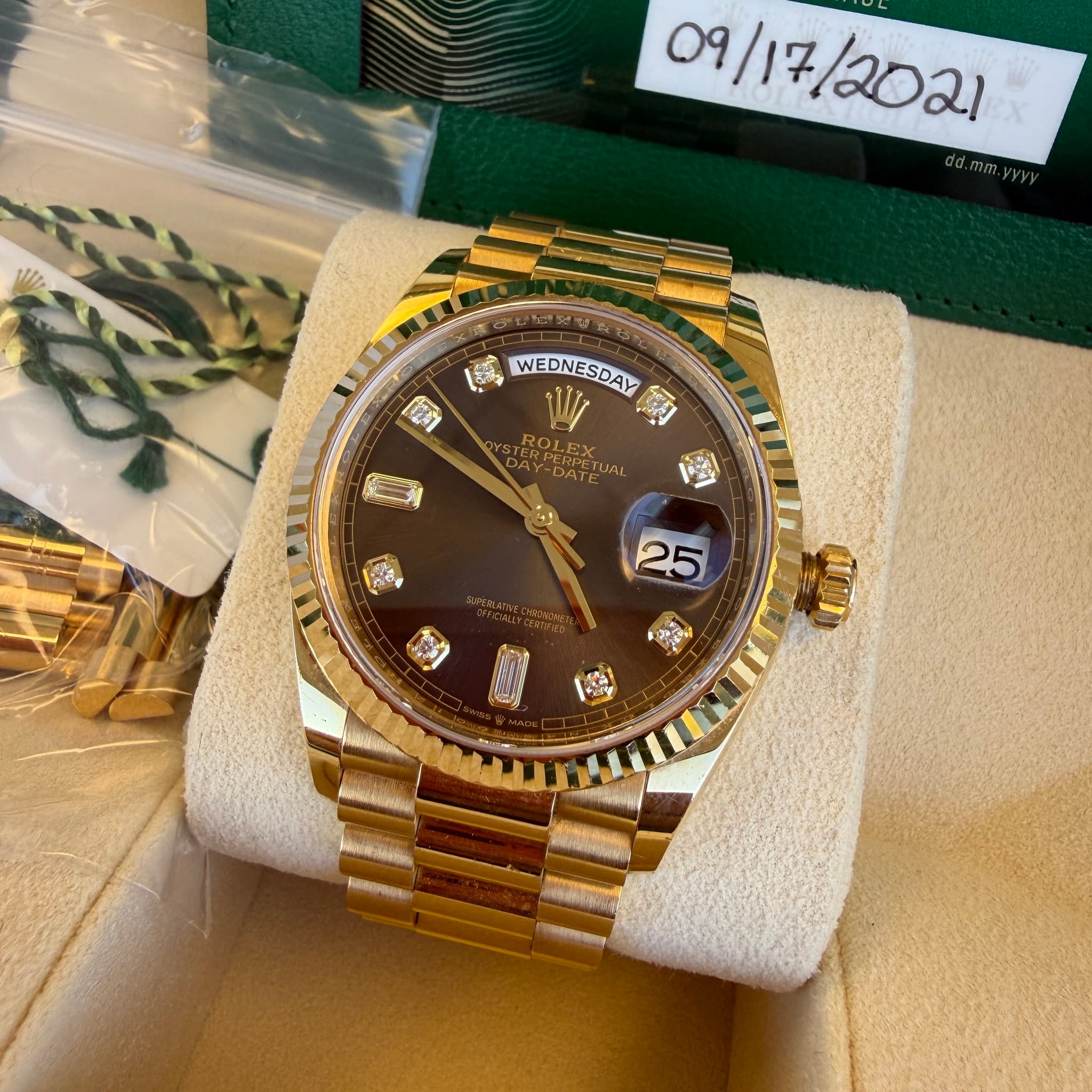 May be an image of wrist watch and text