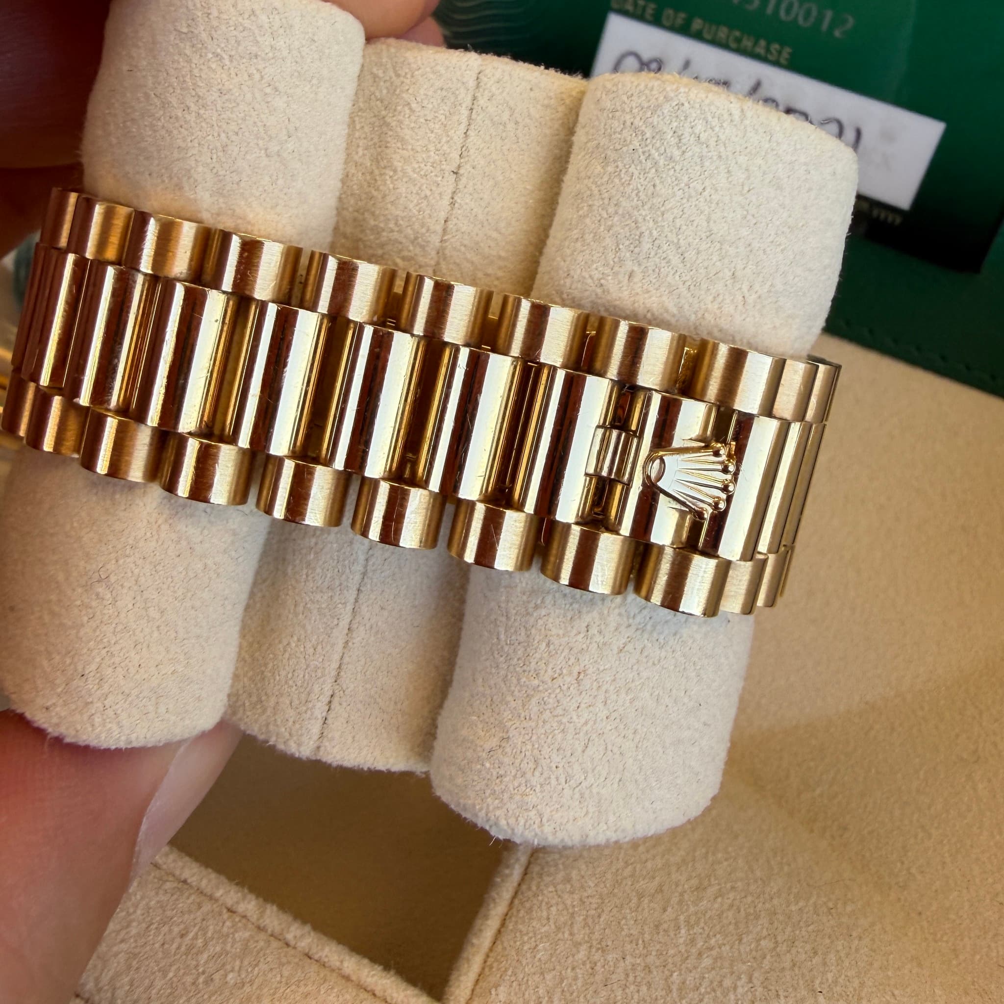 May be an image of wrist watch and text
