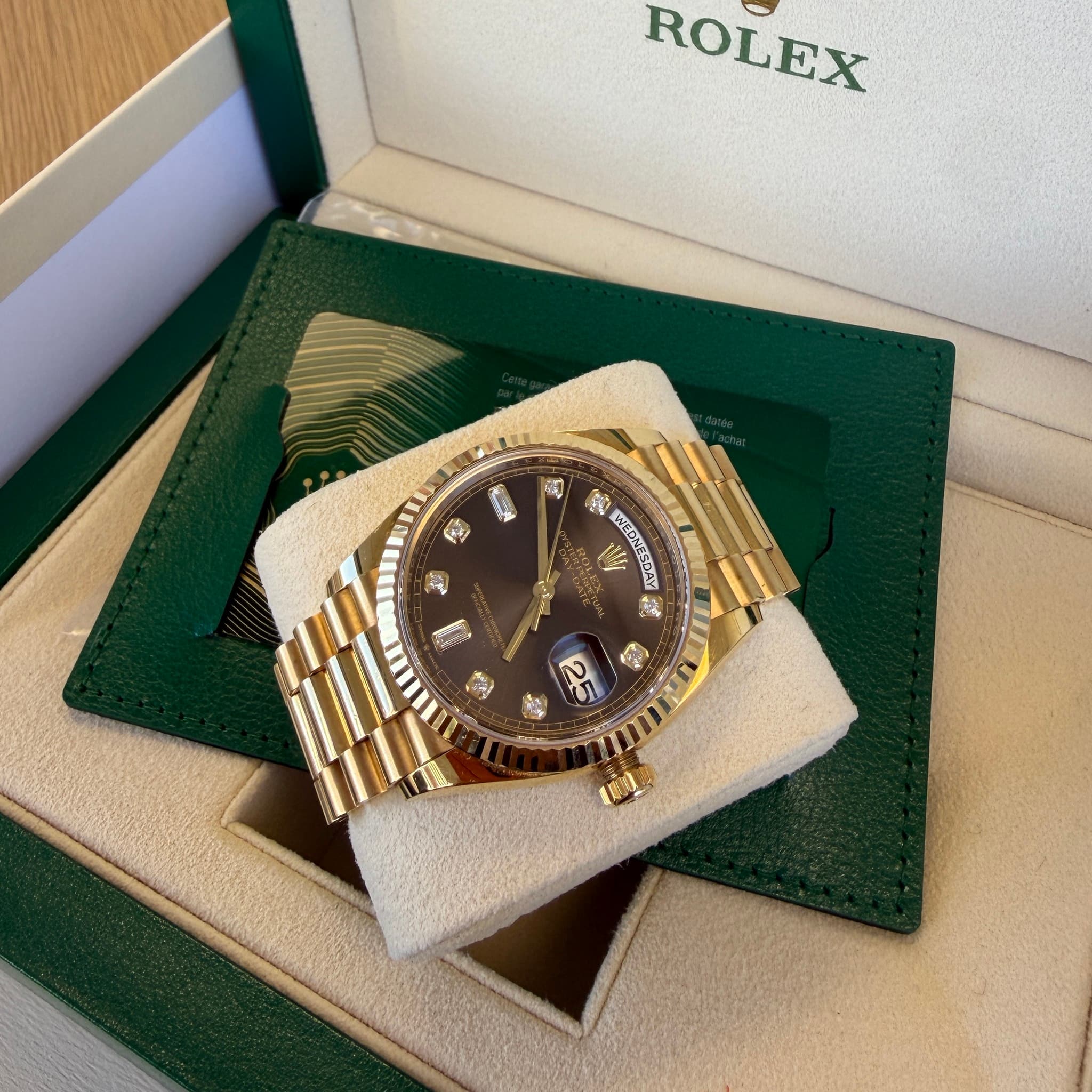 May be an image of wrist watch and text