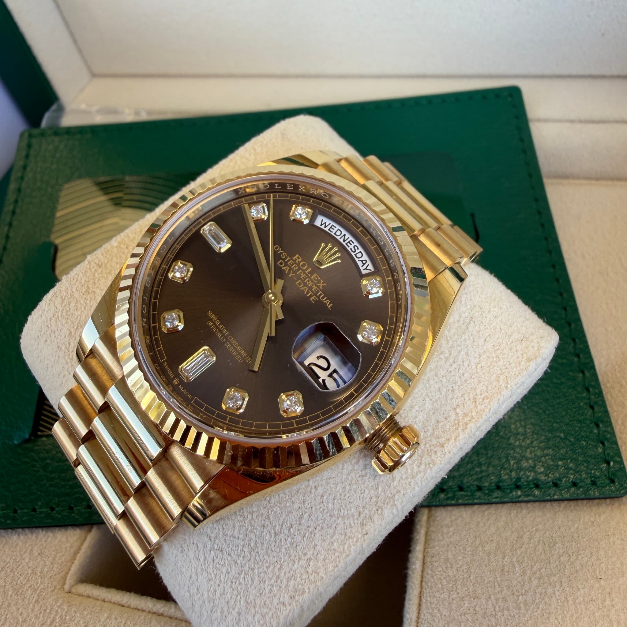 May be an image of wrist watch and text
