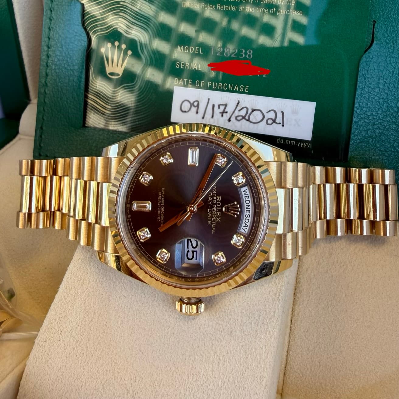 May be an image of wrist watch and text