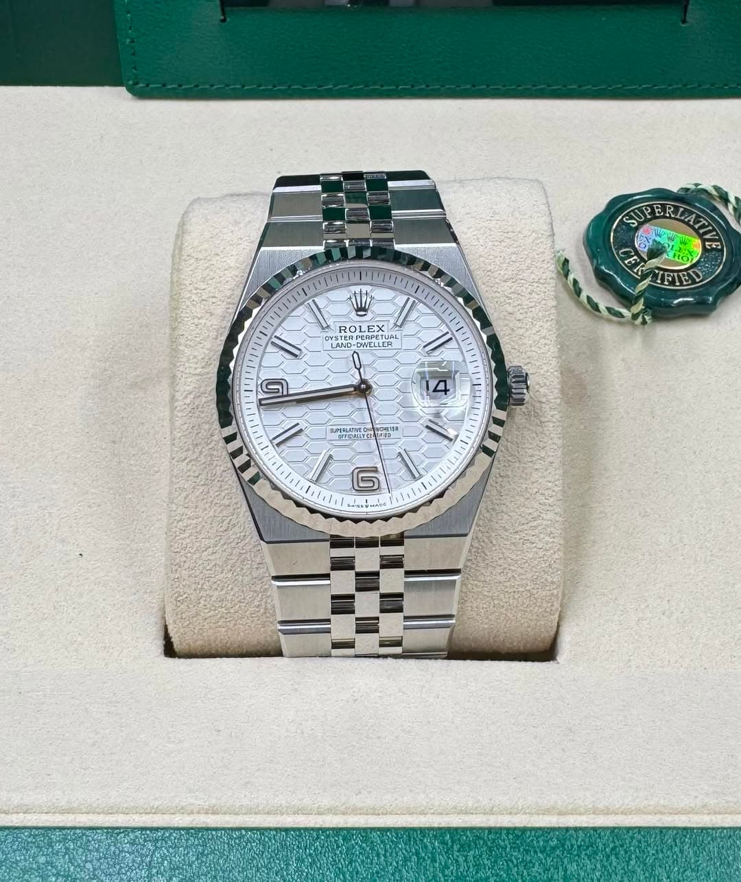 May be an image of wrist watch and text