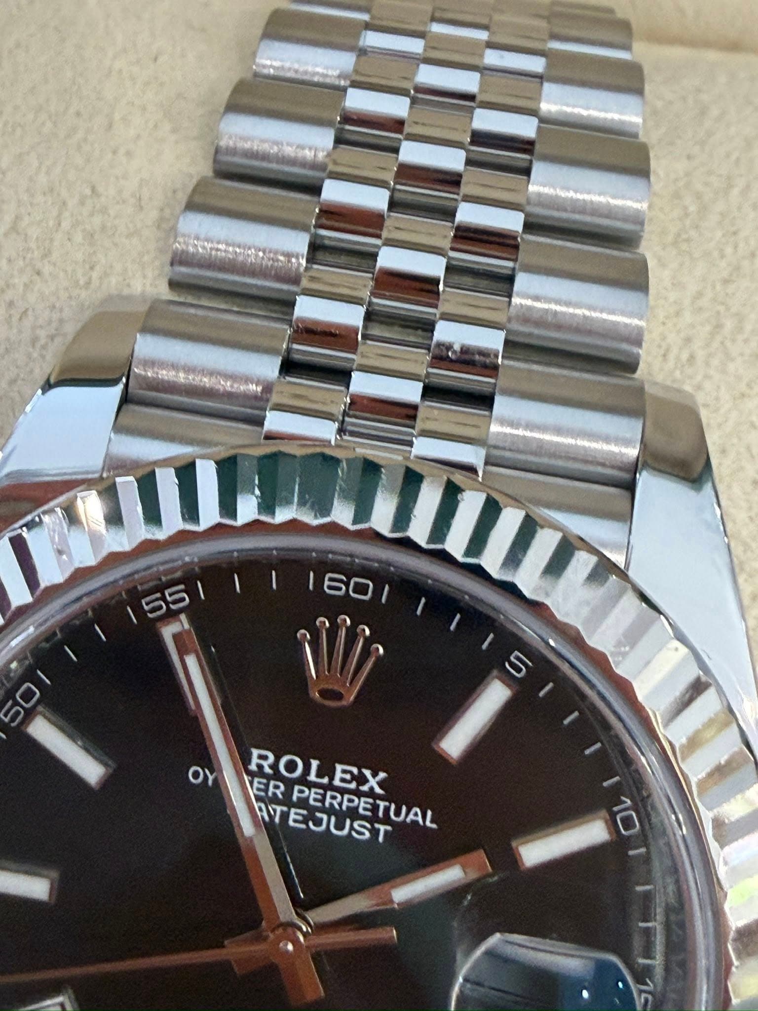 May be an image of wrist watch and text that says '155|1 160 55 ΟΥ ROLEX PERPETUAL PERPE ER ATEJUST AT 10'