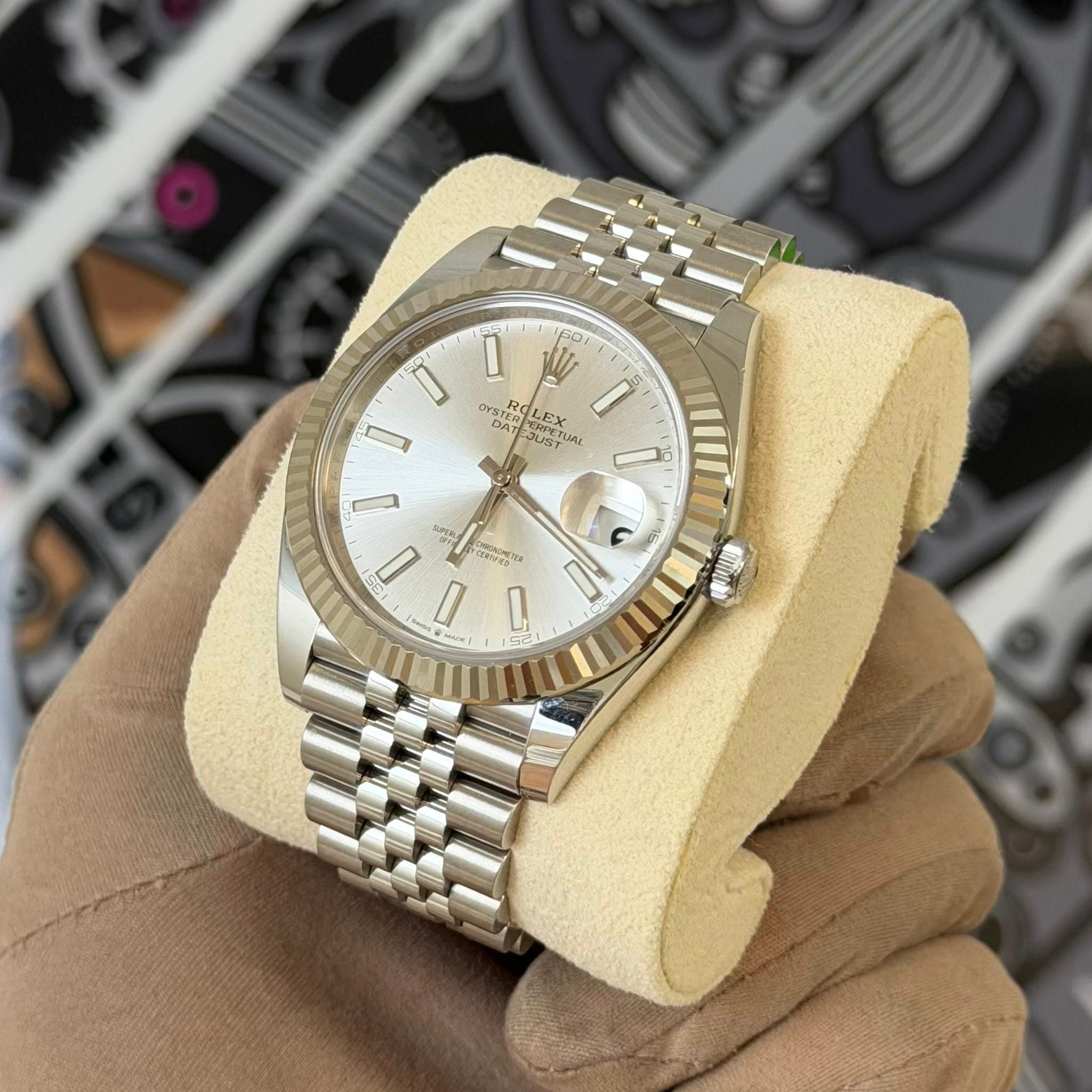 May be an image of wrist watch and text