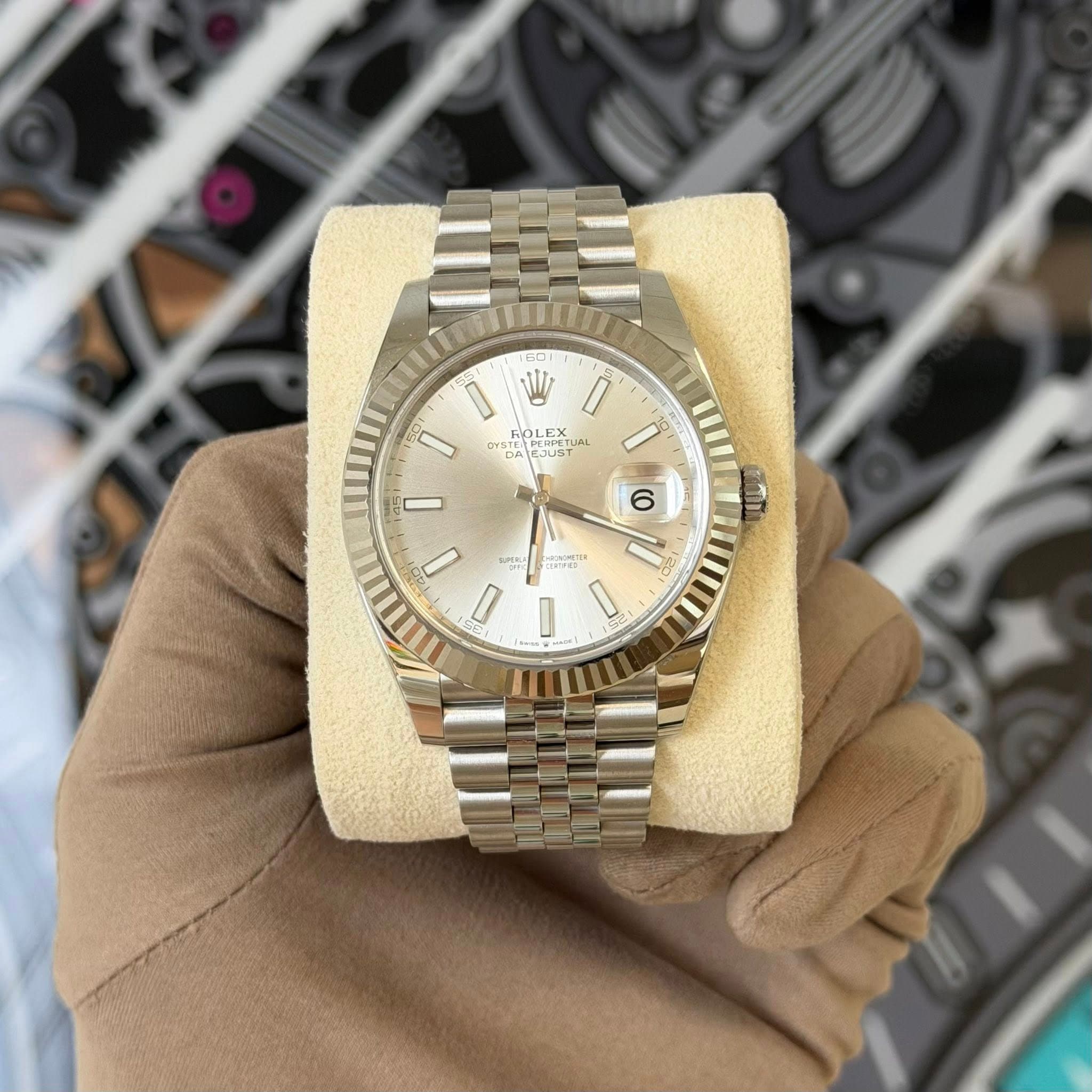 May be an image of wrist watch and text that says '60 1 I AOLC OL OLEX EX SUST UST 6 مقو pajera D N 1 I'