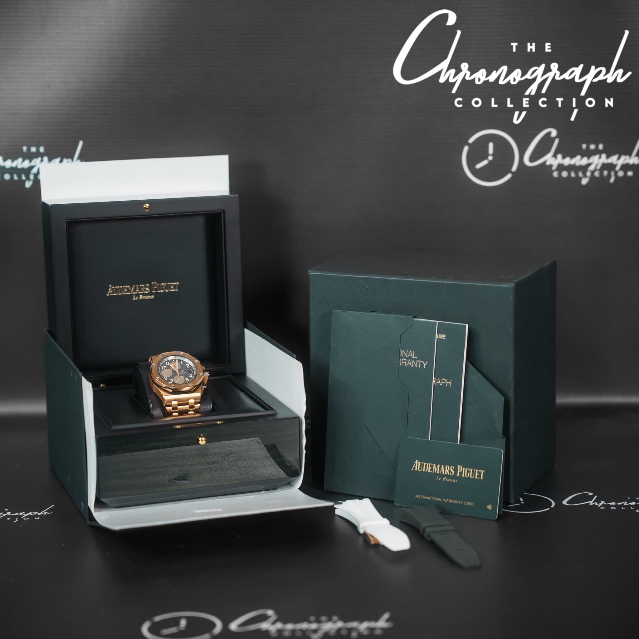 May be an image of wrist watch and text that says 'Chaniijaph THE COLLECTION INAL RANTY AUDEMARS ALDEMARSPIGUET PIGUET Dauht'